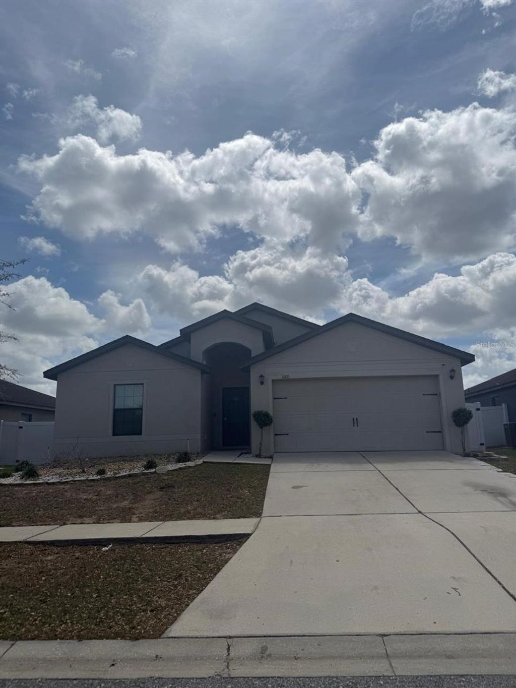 Photo of 680 Swallowtail Drive, Haines City, FL 33844 (MLS # TB8498348)