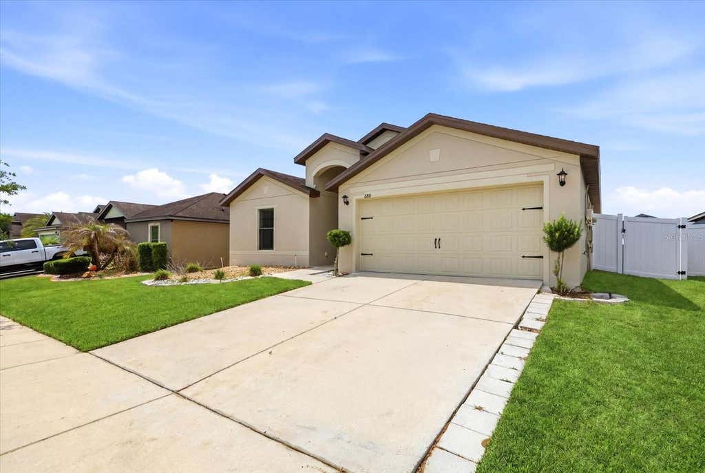 Photo of 680 Swallowtail Drive, Haines City, FL 33844 (MLS # TB8498348)