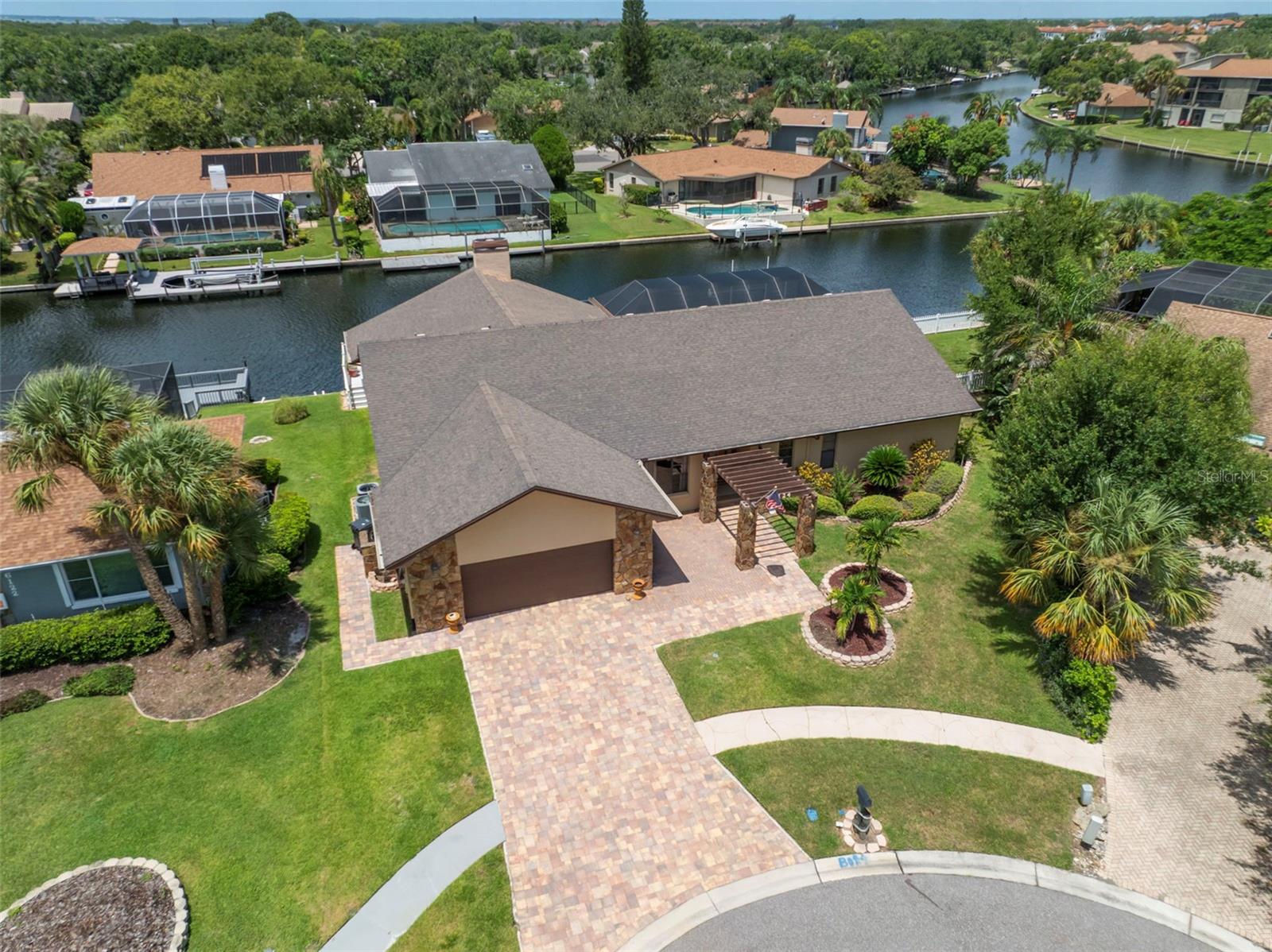 Waterfront Paradise with Direct Access to Tampa Bay. Discover your private retreat in the exclusive gated Villages of Bayport, offering 24-hour security and a prime waterfront location. This 4-bedroom, 3 and half-bath, over sized lot, single-level pool home sits on a quiet cul-de-sac and features a split floor plan with stunning water views from the great room, kitchen, and spacious owner’s suite. The suite includes two walk-in closets and a bath with both tub and shower.
Enjoy effortless living with a laundry room, two-car garage, and a screened deck complete with an outdoor kitchen. Step into your backyard oasis with a private dock and boat lift—perfect for boating, kayaking, canoeing, fishing, or simply soaking in the sunsets. Relax in the pool and spa while entertaining family and friends.
Neighborhood amenities include parks, pickleball, tennis, and basketball courts. For just $150/year, join the community yacht club for holiday parties, boat parades, and more.
Unbeatable location—minutes from Tampa International Airport, University of Tampa, University of South Florida, Hospitals, Nightly Entertainment, World Class Restaurants and shopping at International Plaza, Westshore Business District, Tampa Bay Buccaneers Raymond James Stadium, New York Yankees, Toronto Blue Jays, and Philadelphia Phillies spring training complexes, Tampa Bay Lightning Amalie Arena Downtown Tampa, and Gulf beaches. Close to Upper Tampa Bay Park and top-rated schools, including nearby Berkeley Preparatory.
Your waterfront lifestyle starts here.