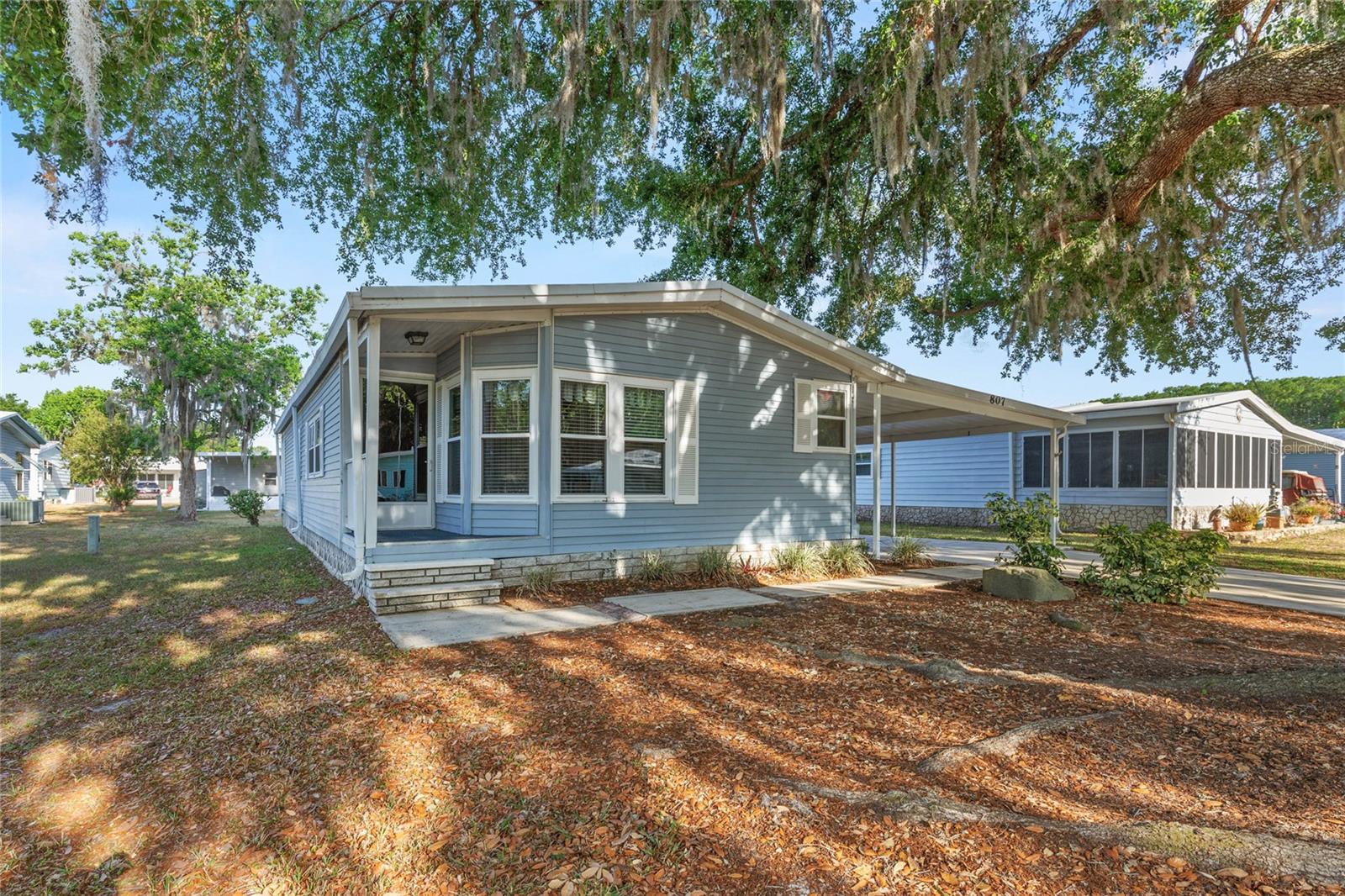 Discover easy Florida living at Continental Country Club! This charming 2-bedroom, 2-bath manufactured home is packed with upgrades and extras, perfect for making the most of every day.
Inside, you'll find a bright, open layout with spacious living and dining areas, a functional kitchen with plenty of storage, and two roomy bedrooms with large closets.
Bonus Alert: This home includes both a Golf Certificate AND a Resident Owner (RO) Certificate — giving you full privileges to the championship 18-hole golf course, clubhouse, pool, and more!
Step outside and fall in love with the huge screened lanai — ideal for morning coffee, hosting happy hours, or just relaxing in the Florida breeze. Plus, there's a golf cart garage/workshop, perfect for your cart, hobbies, or extra storage!
Continental Country Club offers a gated, active lifestyle community — and you’re only a short golf cart ride to amenities and minutes to all the shopping, dining, and entertainment of The Villages.
Move-in ready, value-packed, and ready for your next adventure — schedule your private showing today at 807 Oak Blvd!