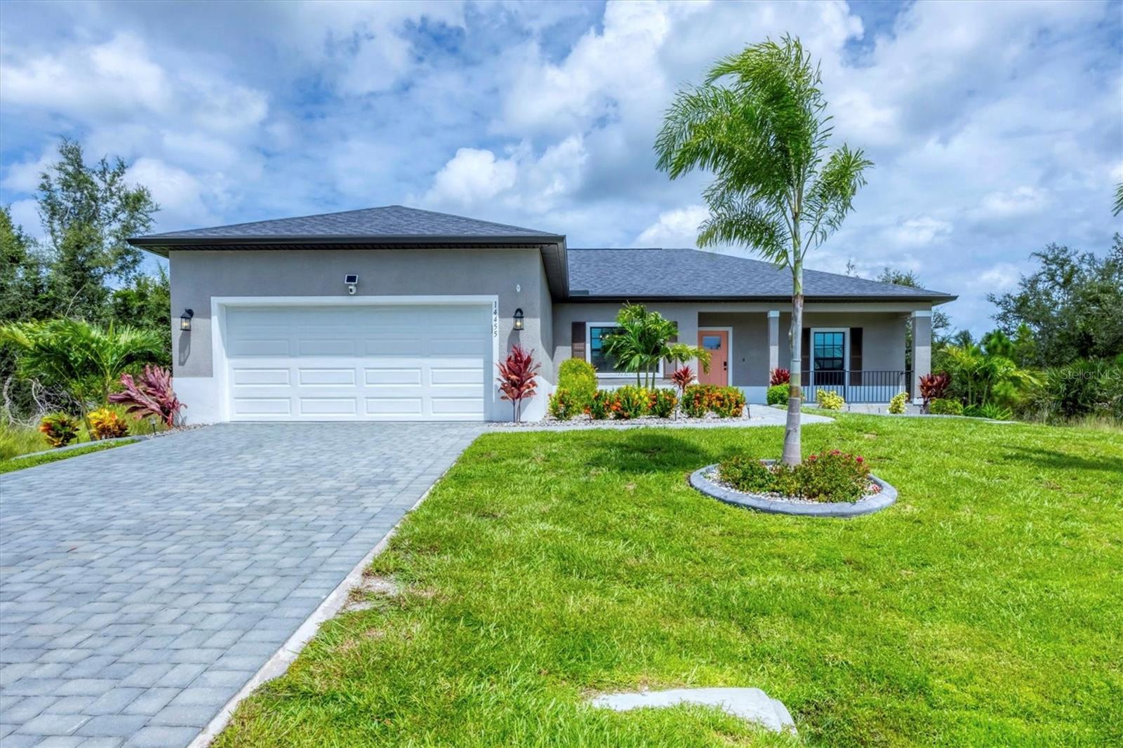Welcome to your dream home in the desirable South Gulf Cove community! Built in 2024, this beautifully crafted 3-bedroom, 2-bathroom residence offers 1,688 sq ft of open-concept living with thoughtful upgrades throughout. <br>
<br>
Step inside to find plank tile flooring flowing seamlessly through the entire home, complemented by high ceilings and abundant natural light. The spacious kitchen is a showstopper with granite countertops, a center island, and stainless steel appliances—perfect for entertaining or everyday living. <br>
<br>
The master suite is a true retreat, featuring dual walk-in closets and a luxurious en-suite bathroom with a walk-in shower. The guest bath offers a convenient tub/shower combo for added flexibility. <br>
<br>
Enjoy peace of mind with all impact-resistant windows and doors, plus the added touches of zebra blinds throughout, rain gutters, and a screened back porch ideal for enjoying Florida’s sunshine year-round or watching the summer showers while enjoying a cup of coffee. <br>
<br>
The 2-car garage includes an epoxy-coated floor and a hand rail, while the professionally landscaped yard boasts concrete curbing, a garden bed with irrigation, and beautiful curb appeal. <br>
<br>
Located in the South Gulf Cove community—a family-friendly, golf cart-friendly neighborhood with canals throughout, large sidewalks, and a boat ramp—you'll be just minutes from top-rated restaurants, pristine beaches, and world-class fishing in Boca Grande. <br>
<br>
Don’t miss your chance to own this stunning, move-in ready home in one of Southwest Florida’s most vibrant waterfront communities!