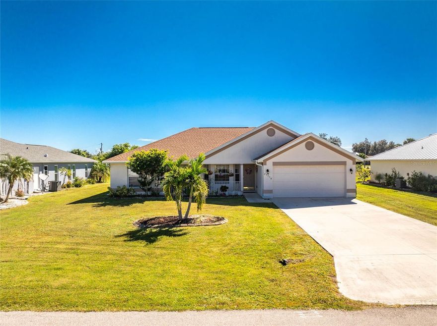 Offered FULLY FURNISHED and with NO FLOOD INSURANCE REQUIRED, this beautifully maintained 3 BED, 2 BATH home sits in the highly sought-after Deep Creek community of Punta Gorda. Thoughtfully designed for both comfort and functionality, it features a BRIGHT, OPEN-CONCEPT KITCHEN AND LIVING ROOM that create a welcoming atmosphere, perfect for everyday living or entertaining with ease. A SPACIOUS DINING ROOM just off the kitchen provides the ideal setting for family meals, gatherings, or hosting guests. Step outside and discover your own PRIVATE OUTDOOR RETREAT. The FULLY FENCED BACKYARD is framed by mature trees and a lush greenbelt, offering exceptional privacy and a peaceful, natural backdrop. The INVITING FRONT PORCH is perfect for enjoying your morning coffee or relaxing evenings, while the backyard offers plenty of room for outdoor living and entertaining. The ATTACHED GARAGE adds extra versatility and includes a WORKBENCH, ideal for hobbies, DIY projects, or additional storage. This MOVE-IN-READY HOME also offers the opportunity to personalize and make it your own over time. A NEW ROOF was recently installed in 2022, providing peace of mind for years to come. Conveniently located near SHOPPING, DINING, BEAUTIFUL BEACHES, AND I-75, this home blends comfort, privacy, and location, making it the perfect place to enjoy all that Southwest Florida has to offer.