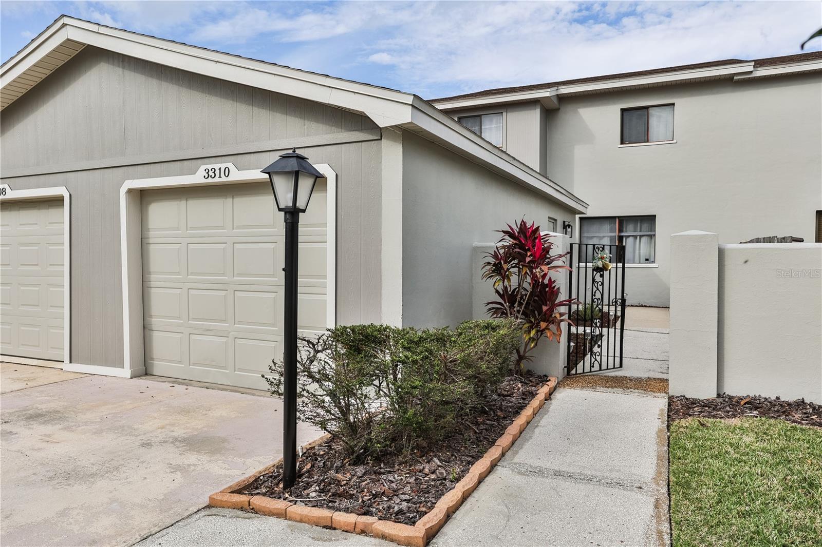 BUYER'S FINANCE FELL THROUGH! This lovely 4 bedroom, 2.5 bathroom, condo townhome is located in the wonderful Somerset community. A beautiful and private courtyard entrance leads you to the front porch and entry. This home features an updated kitchen with gorgeous granite countertops and large dining area, spacious family room and a bonus area perfect for extra seating or office area. Enjoy your days in your secluded back yard and porch area. The inside laundry closet and half bath is also located on the first level. Upstairs enjoys four spacious bedrooms. The primary bedroom is large and bright with ample closet space and en-suite bathroom. Next to the primary is a second bedroom, just as big and currently used as a home office. Down the hall, are two more bedrooms and a second full bath which boasts an updated walk-in shower. This townhouse has been well maintained. Enjoy the community pool and recreational center on your time off; the facility is just a short distance away. The Home Owner's Association features fully funded reserves, fees include cable and internet, roof replacement, exterior painting. The association allows unit owners to plant in the limited common element, courtyard and patio area, subject to the restrictions of the association. Come and see this spacious townhouse in this quiet community fairly close to the Polk Parkway for an easy commute to Tampa or Orlando. Call today to schedule your pre-view.