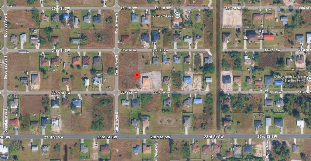 Photo of 4014 22nd Street SW, Lehigh Acres, FL 33976 (MLS # O6388978)
