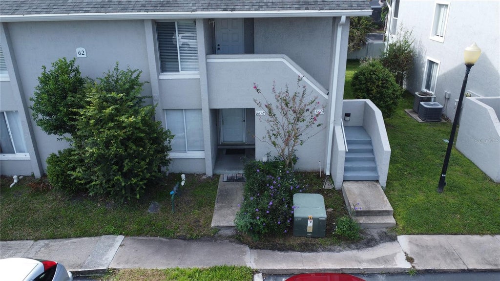 Photo of 5618 Blue Shadows Court #62-3, Orlando, FL 32811 (MLS # O6446717)