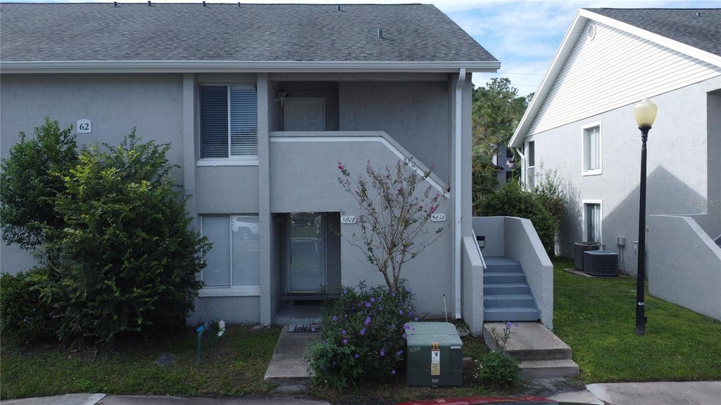 Photo of 5618 Blue Shadows Court #62-3, Orlando, FL 32811 (MLS # O6446717)
