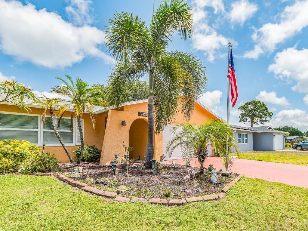 Photo of 12435 Monarch Circle, Seminole, FL 33772 (MLS # TB8506487)