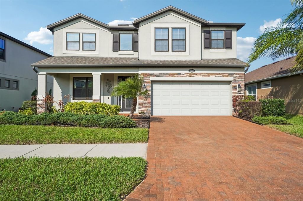 Photo of 19209 Long Lake Ranch Boulevard, Lutz, FL 33558 (MLS # TB8487243)