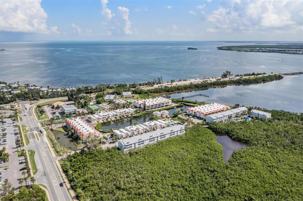 Photo of 3607 E Bay Drive #205, Holmes Beach, FL 34217 (MLS # TB8418777)