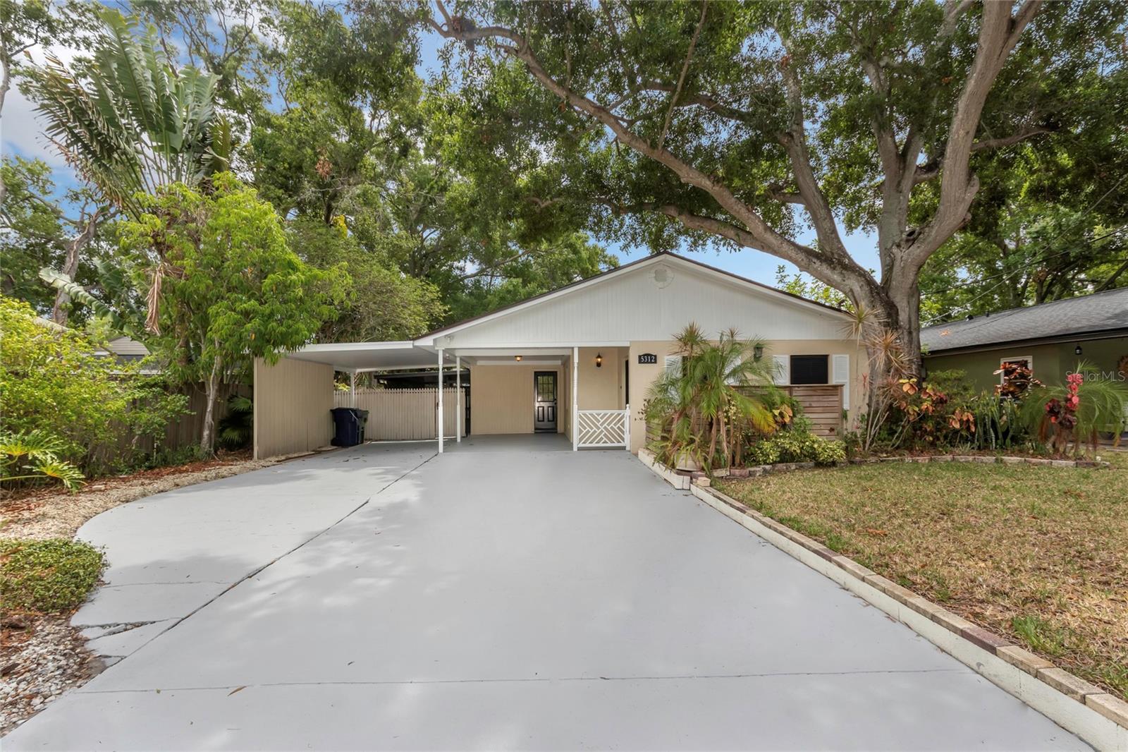 One or more photo(s) has been virtually staged. Now Available – Beautiful Tampa Rental Home! Don’t miss your chance to lease this charming single-family home in Tampa, FL—perfectly located near top dining, shopping, and recreation. The property features mature Florida landscaping, exterior lighting, and a paved driveway leading to a two-car carport, creating an inviting curb appeal.
Step inside to a bright open-concept living and dining area with neutral tones, window blinds, and a ceiling fan for year-round comfort. The updated kitchen boasts stainless steel appliances, real wood cabinetry, and a breakfast bar—ideal for casual meals or entertaining.
The primary bedroom suite offers plush carpeting, a ceiling fan, blinds, and two closets (including a spacious walk-in and a mirrored sliding closet). The primary bath features tile flooring and a stand-up shower. The second bedroom has carpet, sliding closet doors, and easy access to a full bathroom with tile floors and a tub/shower combo.
Enjoy extra living space in the family room, located just off the kitchen, with access to the carport. A tiled laundry room with storage leads to a covered, screened-in back porch with a ceiling fan—perfect for relaxing evenings. The large fenced backyard includes a shed for additional storage.
This home is close to local parks, waterfront islands, and some of Tampa’s best restaurants. With easy access to I-275 and US-41, you’re less than 30 minutes from Tampa International Airport and just a short drive to beaches and downtown.
Schedule your showing today—this Tampa rental won’t last long!