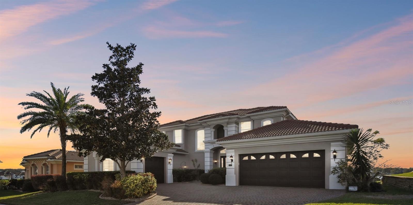 LUXURY LAKEFRONT LIVING IN A GATED COMMUNITY – BRING YOUR BOAT!
Discover the perfect blend of elegance and resort-style living in this gorgeous Toll Brothers-built home, nestled in an exclusive gated lakefront community conveniently located between Tampa and Orlando, just minutes from I-4. Enjoy direct access to Lake Juliana, a stunning 924-acre boating and fishing paradise, with a private community boat ramp for endless water activities.
This energy-efficient masterpiece sits on an oversized lot with serene views of lush trees and the lake, offering a sophisticated Florida-style open-concept design with impeccable architectural details.
RESORT-STYLE AMENITIES & PRIME LOCATION
Indulge in world-class amenities overlooking the pristine 106-acre Lake Tennessee, including:
? Resort-style pool
? Private boat ramp for skiing, canoeing & fishing
? State-of-the-art fitness center & clubhouse
? Tennis & basketball courts
? Playground & walking trails
? Two fish-stocked lakes for the ultimate angler’s retreat
ELEGANT & FUNCTIONAL DESIGN
Step into a grand two-story foyer showcasing a stunning wood & iron staircase. This thoughtfully designed 4-bedroom, 3.5-bath home offers an exceptional floor plan perfect for Florida living.
? Spacious 3-car garage with 2/1 split for added convenience
? Private home office with its own exterior entry door – ideal for remote work
? Grand first-floor master suite featuring tray ceilings, crown molding, and private French door access to the lanai
? Two separate walk-in closets & spa-like ensuite bath
Upstairs, you’ll find:
? Three additional bedrooms, including one with a private ensuite bath
? Open loft area plus a full-sized bonus/family room
LUXURIOUS FINISHES & MODERN CONVENIENCES
? Central vacuum system for effortless maintenance
? Brick-paved, screened lanai with French door access from both the family room & master suite
? Full-size pool bath with shower for easy outdoor living
? Tile roof & irrigation system for a beautifully maintained landscape
PRIME LOCATION
? Brand-new Publix shopping center just around the corner
? Top-rated Berkley schools nearby
This home offers the perfect balance of luxury, comfort, and outdoor adventure—a rare opportunity to enjoy lakefront living at its finest! Schedule your private tour today!