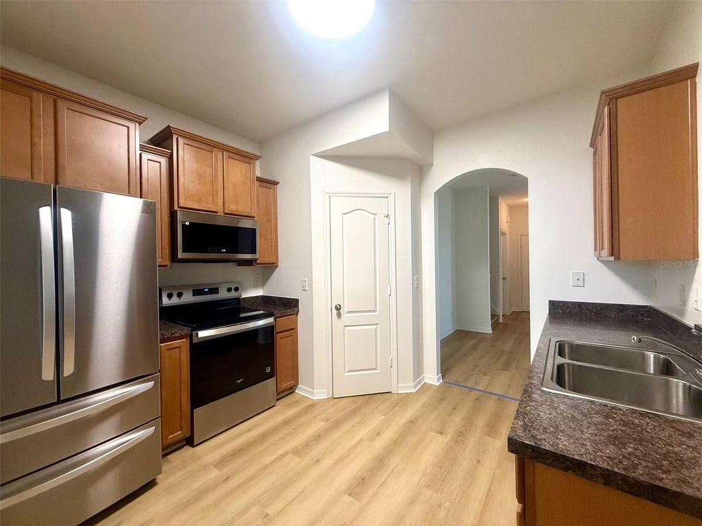 Photo of 1646 Buckeye Falls Way, Orlando, FL 32824 (MLS # O6410505)