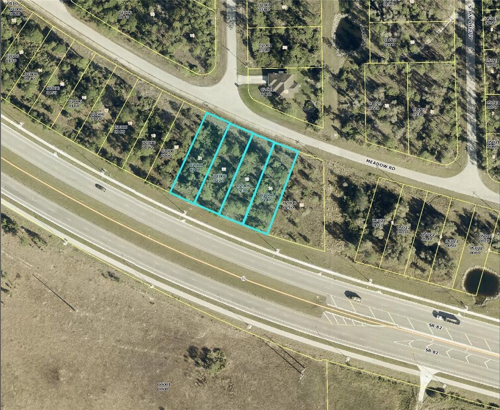 Photo of 2540 Meadow Road, Lehigh Acres, FL 33974 (MLS # T3527984)