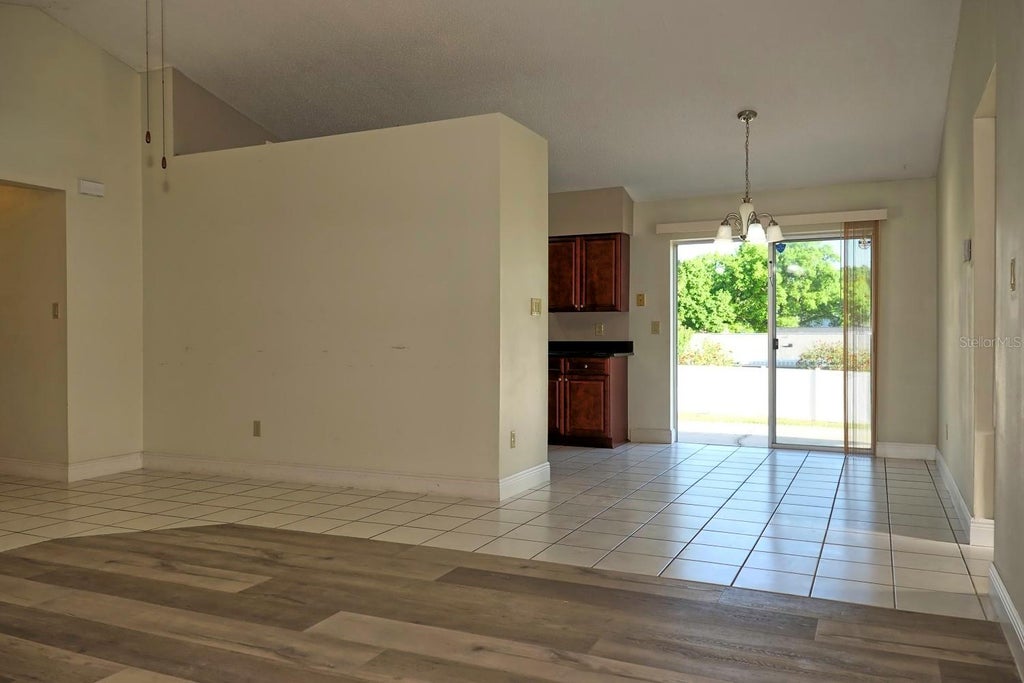 Photo of 7761 Bay Cedar Drive, Orlando, FL 32835 (MLS # O6447158)