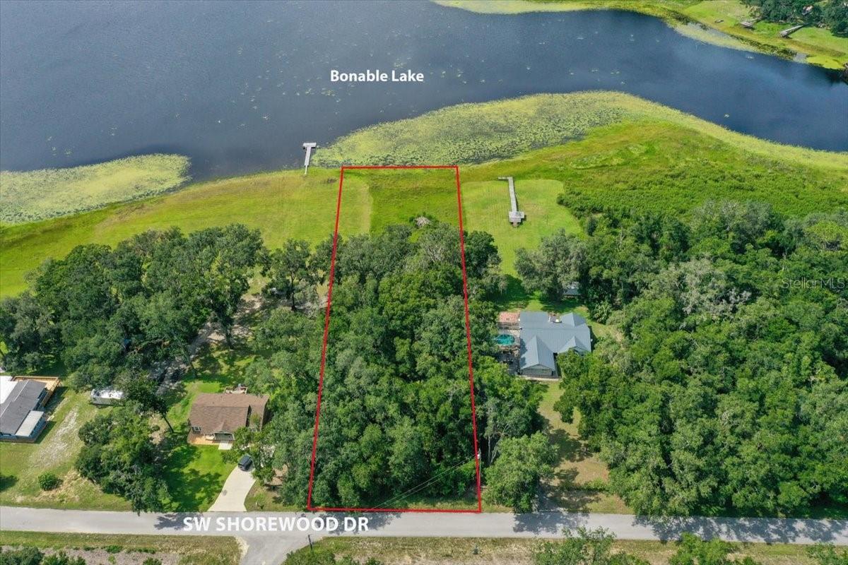 Build your dream home on this beautiful 0.21-acre lot in the peaceful community of Rainbow Lake Estates — complete with charming mandarin and orange trees, as well as a lovely magnolia’s! Enjoy direct lake access and breathtaking views of both sunrise and sunset right from your property. This homesite is ready for construction — soil test and survey are already complete — saving you time and money. Located in a quiet, No HOA neighborhood with light deed restrictions, residents can take advantage of a community park, tennis courts, basketball courts and pickleball. Just minutes from the stunning Rainbow River, you can spend your days swimming, kayaking, or exploring the waterfalls, all while being close to shopping, restaurants and everyday conveniences. Don’t miss this great opportunity to own a ready-to-build homesite in a beautiful, nature-filled setting!