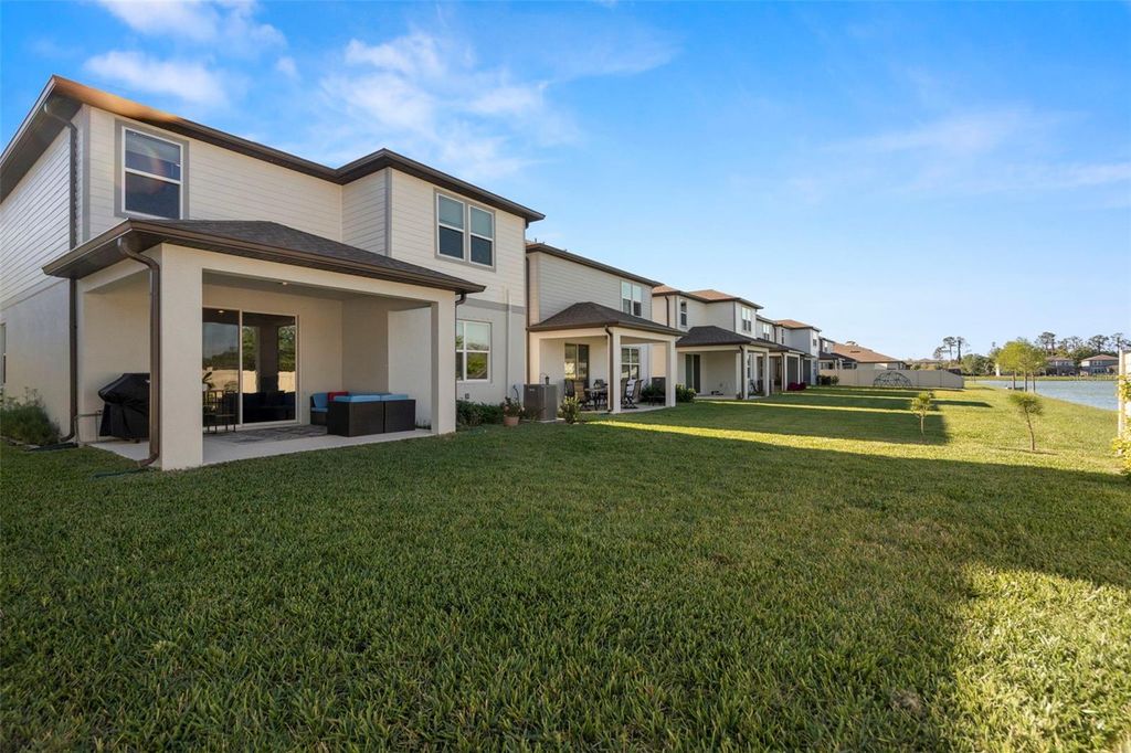 Photo of 21051 Monza Loop, Land O Lakes, FL 34638 (MLS # TB8473987)