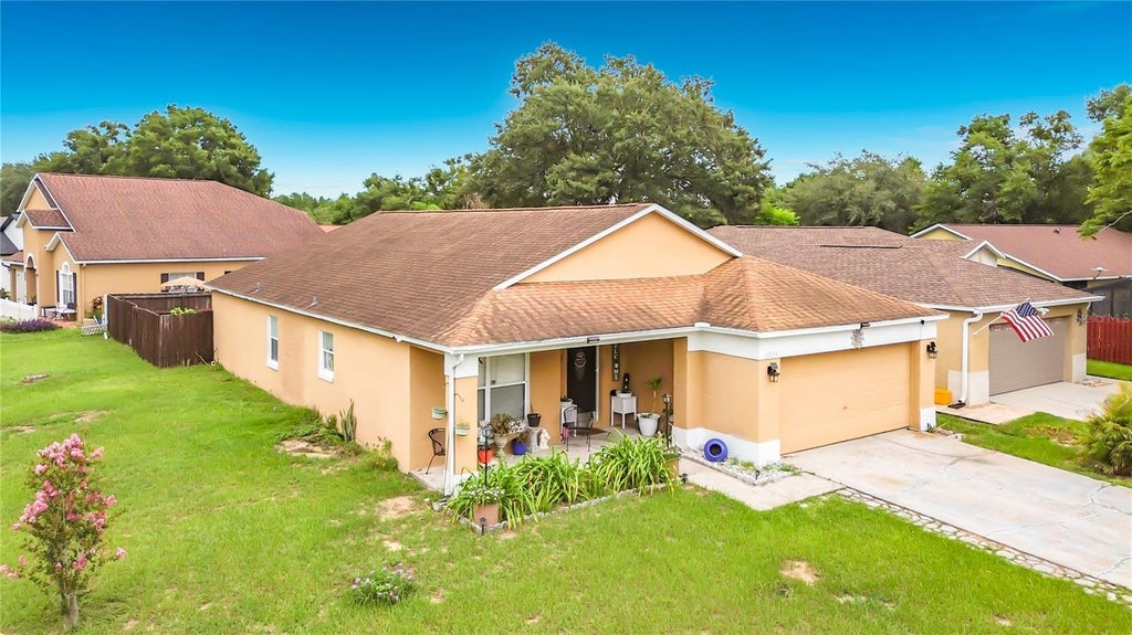 Photo of 17035 Woodcrest Way, Clermont, FL 34714 (MLS # O6427870)