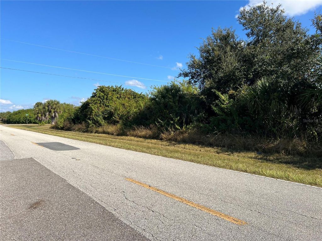 Photo of 416 Theresa Boulevard, Port Charlotte, FL 33954 (MLS # TB8452045)