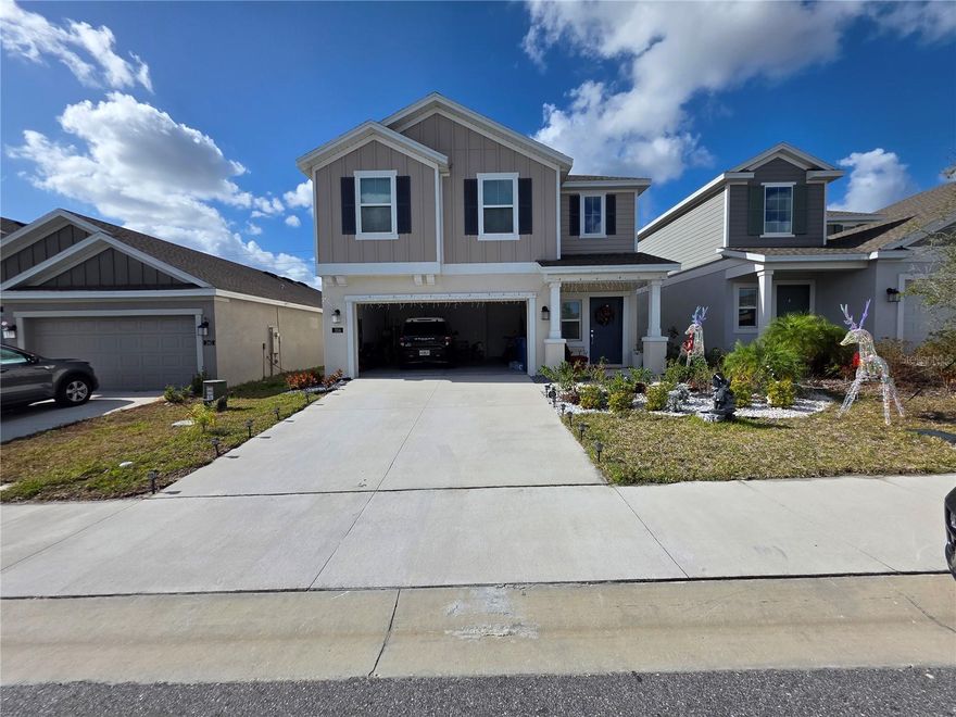 Discover this stunning 2-story home in Davenport's Cascades community. Built in 2023, this modern residence features a bright, open-plan layout designed for comfort and style. The main level shines with elegant tile floors, while the second floor offers cozy carpet throughout the loft and bedrooms. The chef-inspired kitchen is a highlight, boasting premium granite counters and sleek cabinetry. Enjoy outdoor living on your private lanai or take advantage of community amenities, including a pool and playground.