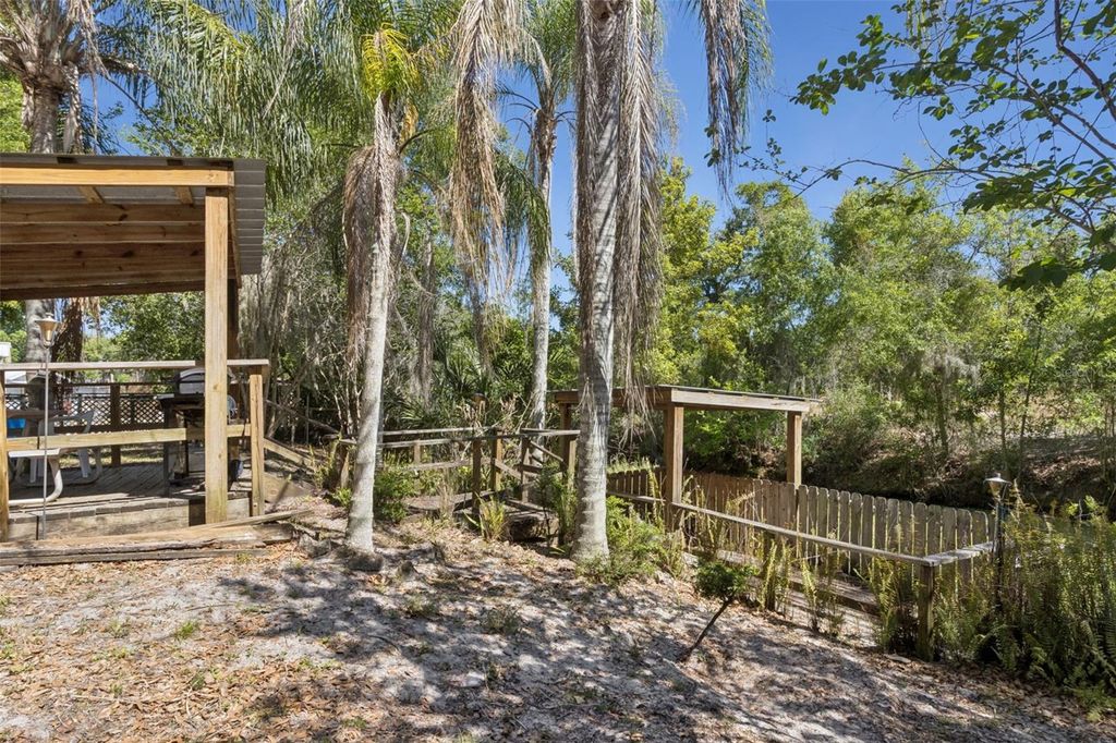 Photo of 1246 Alligator Alley, Haines City, FL 33844 (MLS # O6400974)