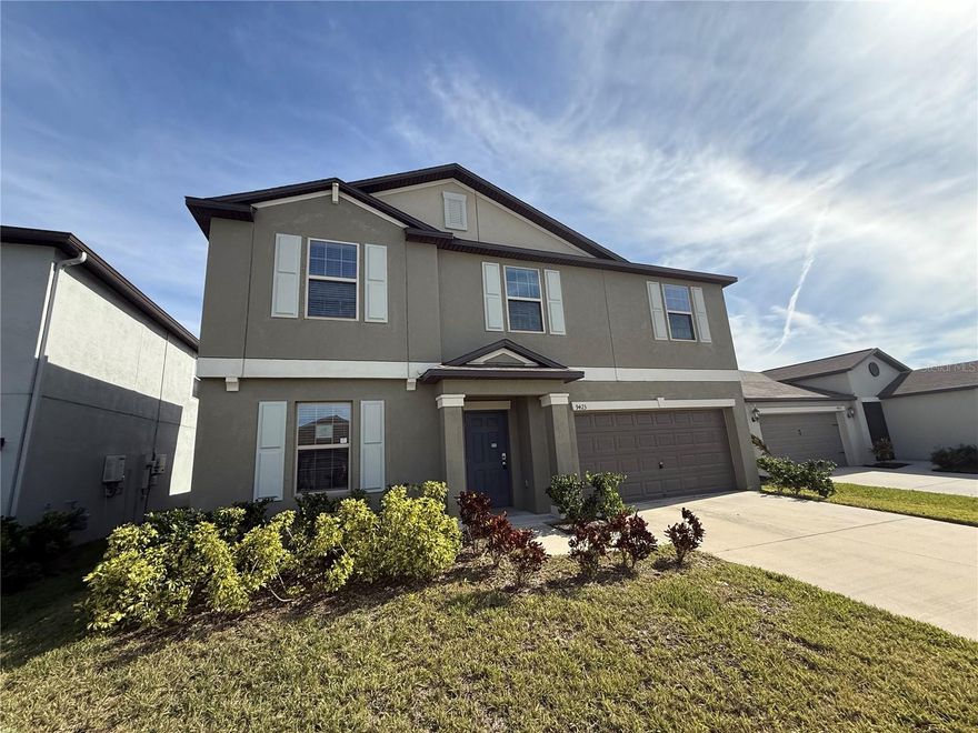 Welcome to Sun City Centers's Belmont Community! With 2949 Square feet, 5 bedrooms/2.5 bathrooms, 2 car garage and Bonus Space, this lovely 2 story home has a lot to offer. Step inside with an enclosed formal living room directly to your left. The kitchen/family room combination is just beyond. Kitchen features handsome dark wood cabinetry, granite counters, oversized center island, closet pantry and dining space. Sliding doors off the family room lead to a generous sized pavered patio and partially fenced backyard. Also located off the family room is the Primary Suite which includes walk in closet, vanity with double sinks and step in shower.  The half bathroom and utility room completes the first floor. Upstairs opens to a 14 x 12 Bonus Space - the perfect space for homework or lounging and then splits off to the four secondary bedrooms sharing a full bathroom. Central location, close to interstate, shopping and restaurants. It's good to be home! This property may qualify for Seller Financing (Vendee).