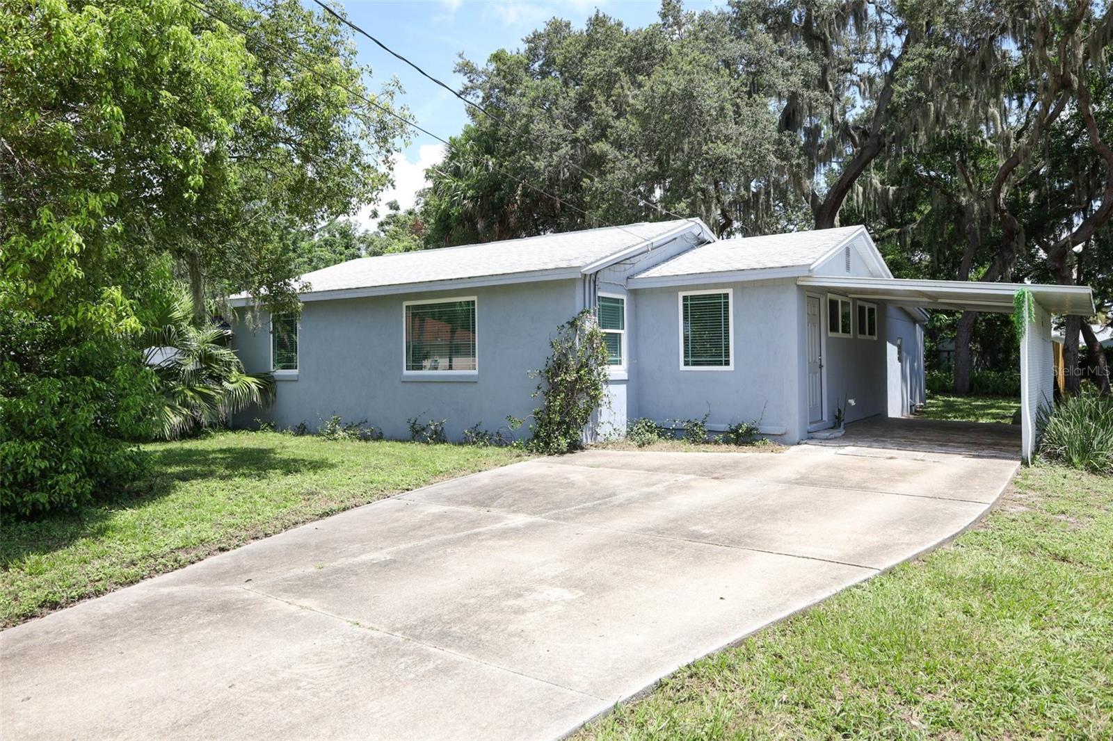 Charming Renovated Bungalow with Modern Upgrades & Vintage Touches
Step into this completely renovated bungalow beauty, where timeless character meets modern comfort. Featuring stylish wood-grain tile flooring throughout, this home offers a seamless blend of warmth, durability, and easy maintenance.
The 2019 kitchen is a standout, showcasing crisp shaker-style cabinetry, granite countertops, and new stainless-steel appliances — perfect for home chefs and entertainers alike. Thoughtful vintage built-in decorative shelving adds charm and personality, while the adjacent dining room features built-in bookshelves for style and storage.
With two comfortable bedrooms and a classy, updated bathroom, every inch of this home is functional, beautiful and inviting. The interior laundry room includes plenty of shelving and space for extra storage — a practical bonus for everyday living.
Step outside to your own private escape: a large, fenced backyard with mature landscaping and ample room to relax, play, or garden. The covered brick paver space is versatile — use it as covered parking or transform it into your new favorite outdoor entertaining area.
This home is the perfect blend of classic and contemporary — ideal for anyone looking for a low-maintenance lifestyle in a thoughtfully updated space. In addition to the interior upgrades, there is no need to stress over the essentials - the solid block home boasts a brand new HVAC (8/2024), Energy-efficient, double-pane windows (2021), custom fit wood-grain blinds (2021), Septic drain field (2020), Water softener/treatment system (2020), Shingle roof (2018), as well as updated electrical panel (2001).
Make an appointment NOW to see this move-in ready GEM!