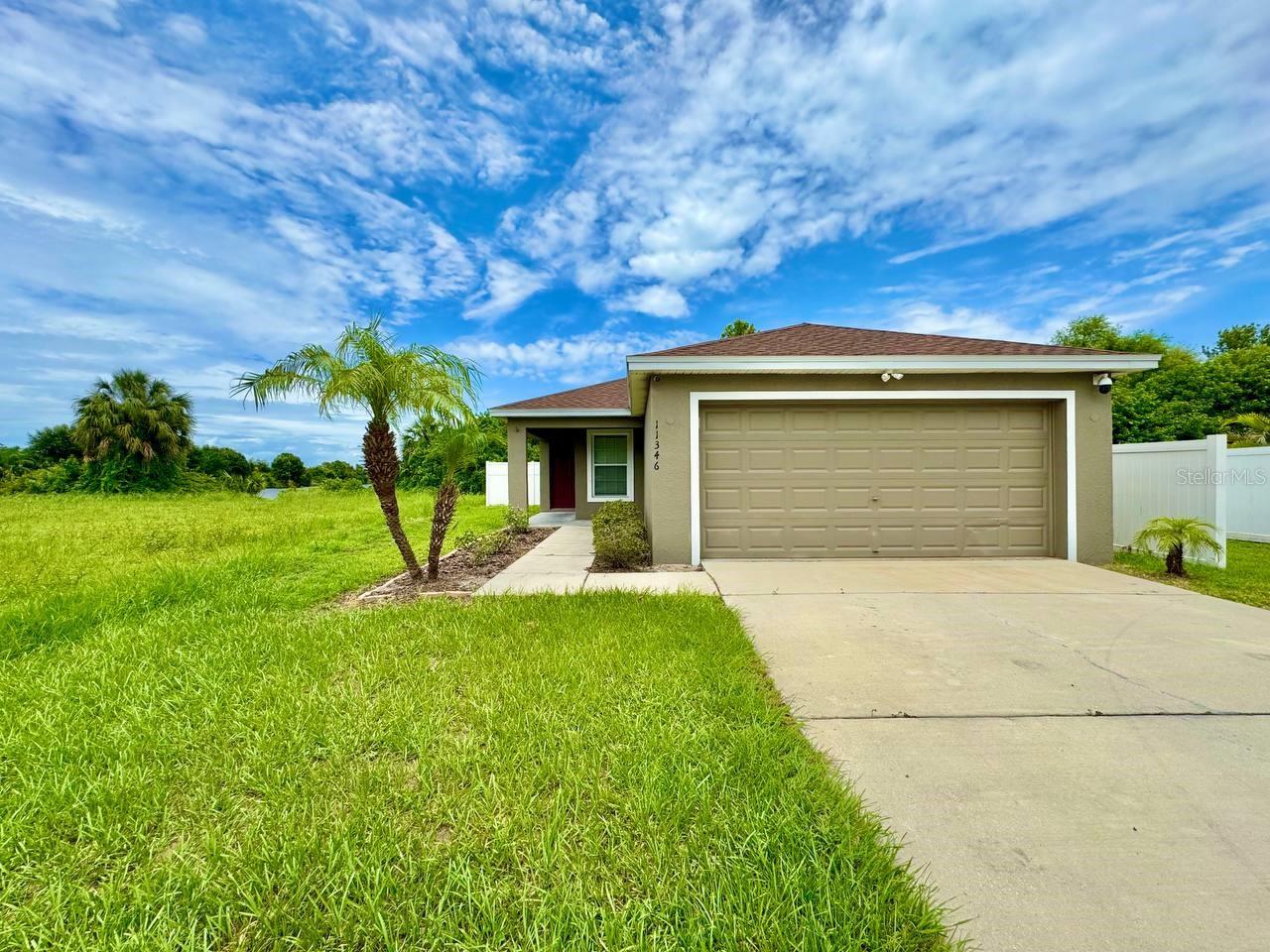 Welcome home to this well-maintained 3-bedroom, 2-bath home in Gibsonton with a pond view, featuring a desirable split floor plan and a spacious 2-car garage. With vinyl plank flooring throughout, this home offers both style and durability. The heart of the home is the open-concept kitchen and living room, perfect for everyday living and entertaining. The primary suite is a peaceful retreat, complete with a walk-in closet and an en-suite bathroom featuring a double vanity and a walk-in shower. Ceiling fans throughout the home provide added comfort, and for your enjoyment, the TV in the living room stays with the home. Step out to the screened-in back patio, ideal for entertaining or simply relaxing as you take in the tranquil pond view. Additional features include washer and dryer hookups, making laundry a breeze. Conveniently located near shopping, dining, and major highways, this home is a must-see! In addition to the advertised base rent, all residents are enrolled in the Resident Benefits Package (RBP) for $50.00/month which includes HVAC air filter delivery, credit building to help boost your credit score with timely rent payments, utility concierge service making utility connection a breeze during your move-in, and much more! More details upon application. Pets welcome, 2 max. Vacant and Available!