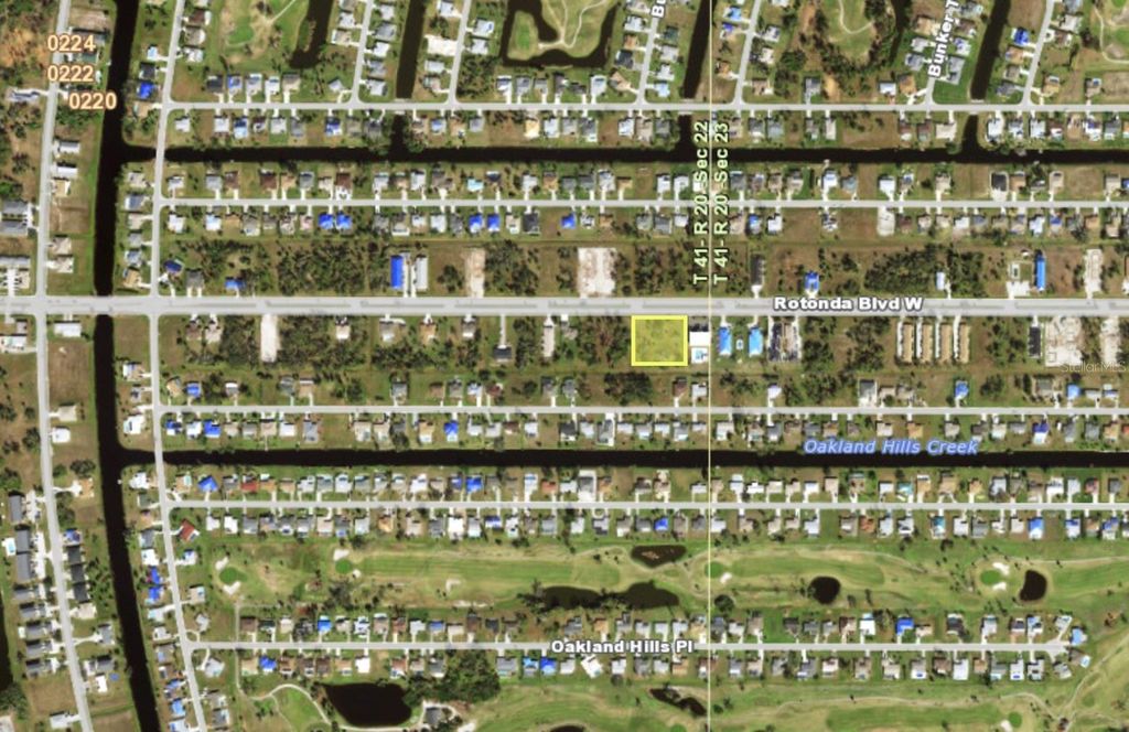 Photo of 241 Rotonda Boulevard W, Rotonda West, FL 33947 (MLS # D6146760)