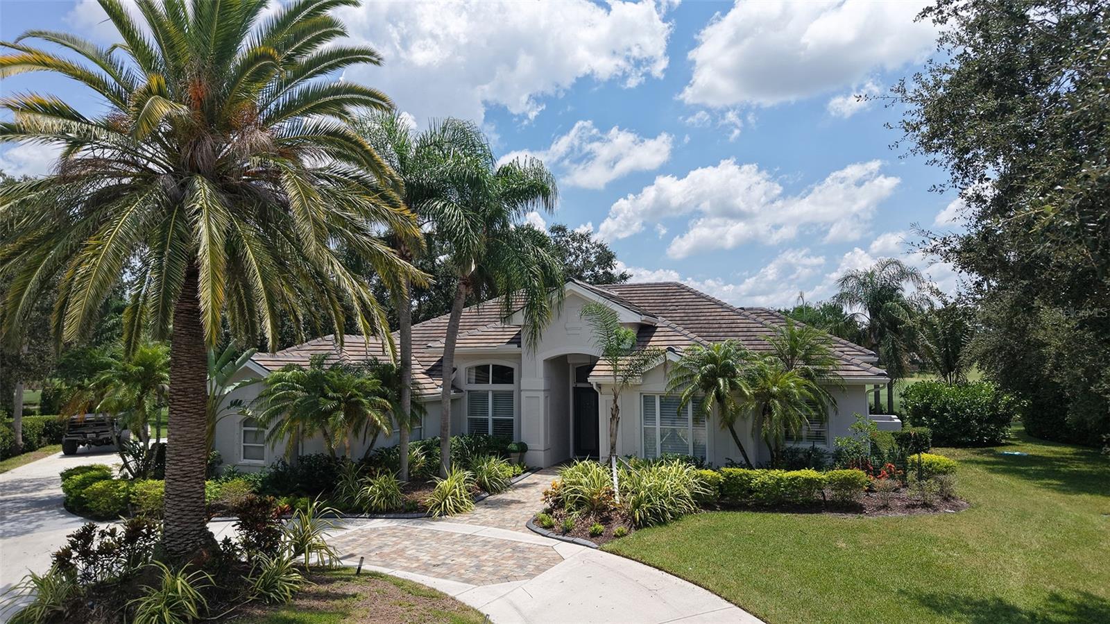 Prestigious Laurel Oak Estates! Custom 3900 sq ft home built by Anchor Builders features Lake & Golf course view of the 16th fairway of the Championship Player course. Completely remodeled and move-in ready!
Circle driveway leads you to a double door entry with leaded beveled glass front doors. Step inside to the living room with fabulous views of pool and golf course. Enjoy entertaining in separate dining room. High ceilings, 8 ft doors and engineered wood flooring. Spacious office with built-ins & natural lighting. Powder room has champagne gold fixtures & quartz vanity.
Master retreat has silhouette blinds with remotes and French doors leading to pool area. Master bathroom has custom shelving in oversized closet, a tankless hot water tank, walk-in shower, marble flooring, freestanding tub and dual sinks.
Gourmet kitchen with top-of-the-line appliances, counter seating easliy seats 4, gas cooktop, coffee bar, beverage refrig, quartz countertops and lots of cabinetry. Enjoy with guests the large family room featuring stone wall, electric fireplace and glass cabinet for wine storage! Two guest suites have window seating, and the bath has high counters and dual sinks. Wait, there's more!! Additional guest suite at rear of home with view of golf course and separate bath and a deluxe shower. Need more? Bonus room could be additional 5th bedroom, full bath a separate entry and
great for in-law suite or guests, Outdoor living with large 30 x 18 pool, spa, outdoor kitchen & full bath. Solar panels were installed in '22, roof replaced in '20 and 2 AC's replaced in '20.
Laurel Oak Country Club memberships are optional for golf, tennis, pickleball and social activities. Two 18-hole championship golf courses, 12 Har-Tru tennis courts and an active social calendar. Purchase a home in Laurel Oak Estates & go to the top of the wait list! Live the Lifestyle in Laurel Oak!
