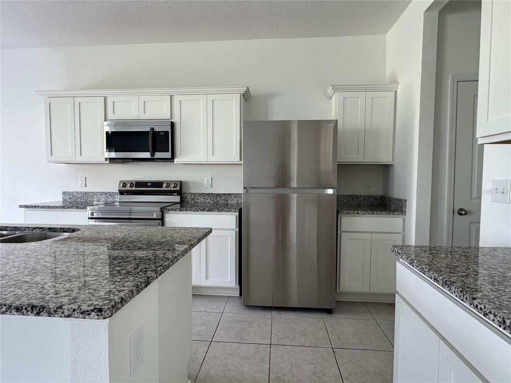 Photo of 2669 Buttercup Avenue, Haines City, FL 33844 (MLS # S5156312)