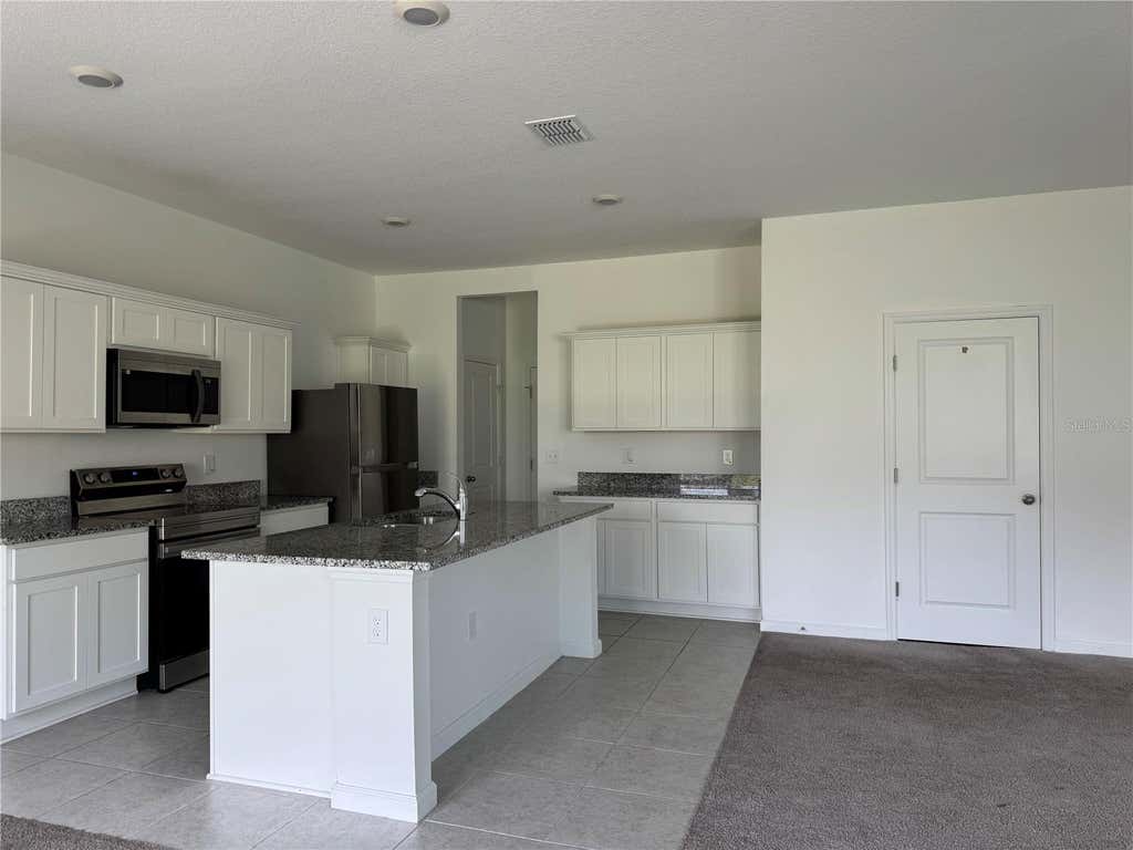 Photo of 2669 Buttercup Avenue, Haines City, FL 33844 (MLS # S5156312)