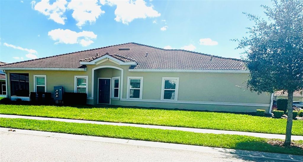 Photo of 1051 Quaker Ridge Lane, Davenport, FL 33896 (MLS # O6390847)