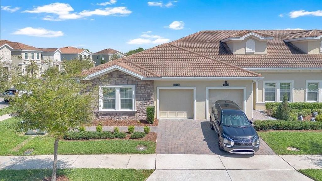 Photo of 1051 Quaker Ridge Lane, Davenport, FL 33896 (MLS # O6390847)