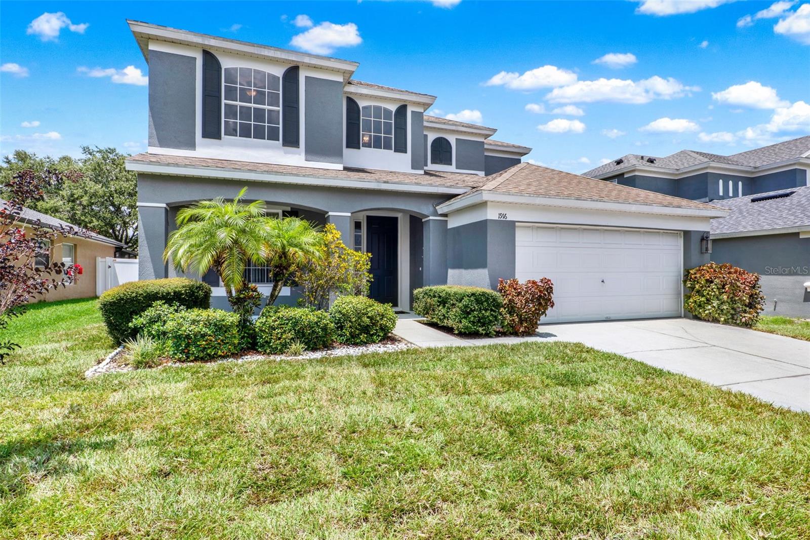 Welcome Home to the Gated Community of Oakhurst Reserve! This sought-after neighborhood is quietly tucked away off Red Bug Lake Road near Tuskawilla, featuring a stately gated entrance, tree-lined streets, a sparkling community pool, and a playground for the little ones. This beautiful two-story home offers 2,500 square feet, including 4 upstairs bedrooms, a dedicated office downstairs, and 3.5 bathrooms, ideal for families of all sizes. As you arrive, you are greeted by fresh landscaping with new front sod and a charming front porch. Inside, the grand foyer boasts soaring volume ceilings and a dramatic cascading staircase that immediately makes a statement. The open-concept great room features laminate flooring and crown molding, and is filled with natural light, creating an inviting space to relax or entertain. The eat-in kitchen comes fully equipped with granite countertops, stainless steel appliances, and a center island, flowing effortlessly into the formal dining room, which overlooks a spacious backyard and beautiful trees. Sliding glass doors open to a screened-in patio, a great spot for your morning coffee, then out into the fenced backyard, offering a wonderful space for kids to play and the pups to roam freely. Upstairs, the primary suite is a private retreat featuring dual walk-in closets, a dual-sink vanity, garden tub, and a separate shower stall. Two of the secondary bedrooms have private access to their own full bath, perfect for guests or growing families. The upstairs laundry room includes a utility sink for added convenience. Some recent updates include a freshly painted interior, brand-new water heater, brand-new oven/range, new sod in the front yard, plus all 22 windows were recently serviced to operate like new. This well-maintained and truly-loved home is ideally situated with quick access to the 417 and just minutes from major shopping plazas, popular restaurants, and everyday essentials like Target, TJ Maxx, Home Depot, and Publix. Enjoy being only 20 min from UCF, Oviedo on the Park, and Winter Park, and 30 min from Downtown Orlando and Orlando International Airport (MCO). Offering room to grow, space to gather, and a location that complements your lifestyle, this home is ready to welcome its next new owners!
