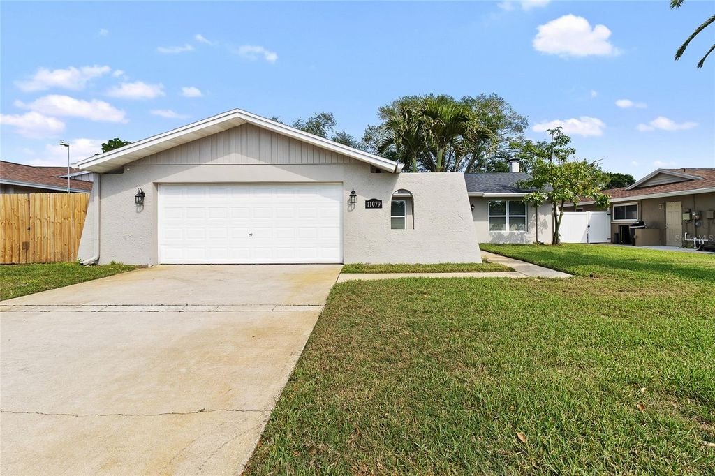 Photo of 11079 Bella Loma Drive, Largo, FL 33774 (MLS # TB8493391)