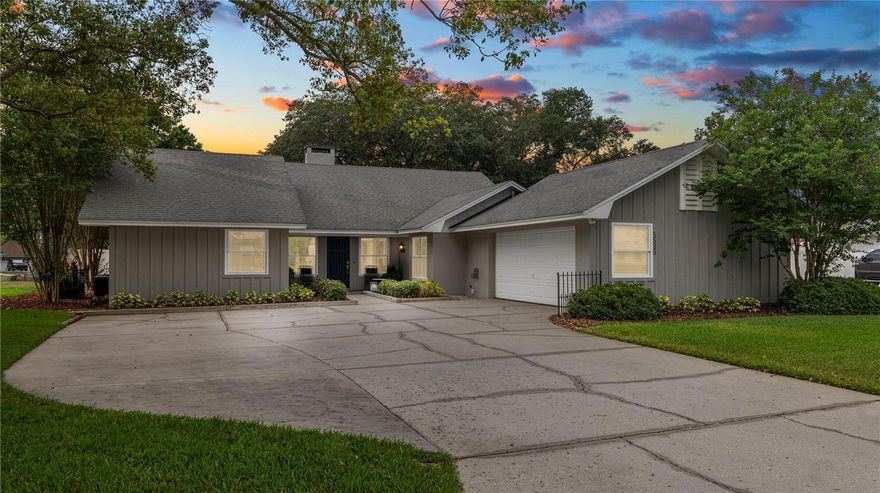 Tucked away in an established South Lakeland neighborhood, this beautifully maintained 4-bedroom, 2-bath home offers over 2,500 square feet of comfortable living space with a functional layout and incredible outdoor living areas. Built in 1984, the home welcomes you with soaring vaulted ceilings, engineered wood flooring, and a stunning floor-to-ceiling stone wood-burning fireplace that anchors the spacious main living area.

The open floor plan flows seamlessly between the living room, formal dining area, and kitchen, creating an ideal setup for everyday living and entertaining. The kitchen offers great workspace and storage, along with a convenient pass-through window that keeps the space connected while still providing separation from the main living areas. A bonus/family room on the opposite side of the fireplace features French doors leading to an expansive screened porch measuring approximately 39’ x 12.5’ — the perfect place to relax and enjoy Florida living year-round.

TRIPLE SPLIT BEDROOM PLAN....The oversized primary suite offers plenty of room to unwind and includes a spacious en suite bath with a jetted tub, separate walk-in shower, and direct access to the screened porch. Bedrooms two and three are generously sized and each feature walk-in closets. The fourth bedroom, located off the bonus/family room, features engineered wood flooring, double-door entry, and a closet, making it ideal as a bedroom, home office, flex space, or hobby room.

**OUTDOOR LIVING truly shines at this property.** The huge screened porch overlooks a beautifully kept backyard complete with garden areas, a potting shed, and a fenced gardening space. A double gate provides access to an additional  area perfect for storing a boat, RV, or recreational vehicles. On the opposite end of the porch, you’ll find a covered outdoor cooking area with a fan, outdoor shower, and adjoining patio space designed for entertaining and enjoying the outdoors.

IMPECCABLY MAINTAINED with evident PRIDE OF OWNERSHIP throughout, this home also features an oversized driveway with ample parking space. A rare opportunity to own a spacious, well-cared-for home with exceptional indoor and outdoor living located close to the POLK PARKWAY for easy access to all Lakeland has to offer as well as commutes to Tampa and Orlando as well as central Florida Beaches and Attractions!  You need to see this amazing home in person, schedule a showing today!
