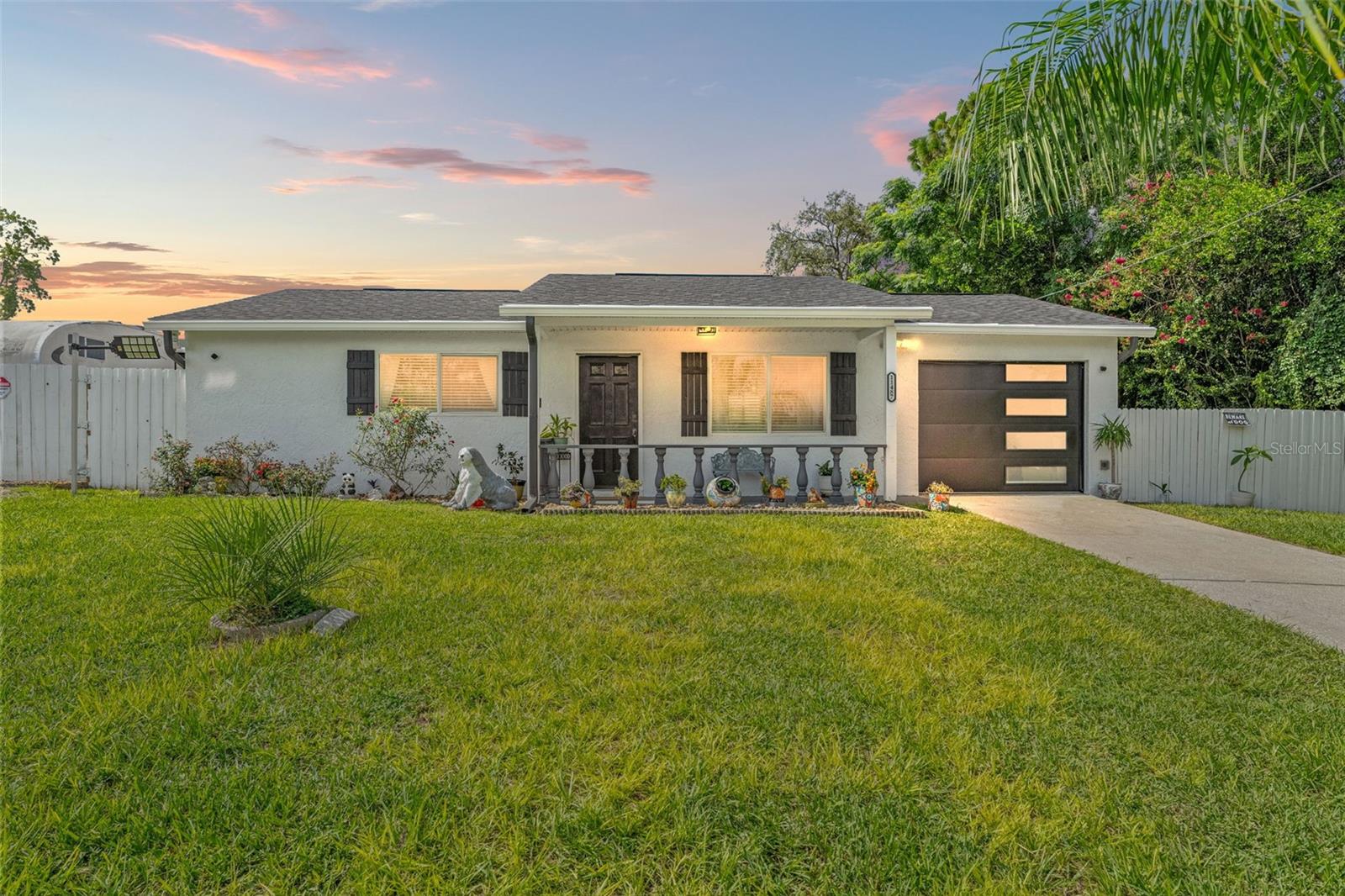 Welcome to this beautifully updated property that perfectly blends style, comfort, and functionality. Offering 3 bedrooms and 2 bathrooms between the main home and an accessory dwelling unit (ADU), this home is ideal for multigenerational living, hosting guests, or generating rental income.
Every detail has been thoughtfully upgraded, including a new roof (2025), new AC system (2023), new water heater (2024), modern garage door, and all new windows and doors. Inside, you'll find a bright and welcoming open layout with stylish finishes, wood-look flooring, a fully remodeled kitchen with stainless steel appliances, and bathrooms that boast custom tilework and matte black fixtures. The home also features all brand new appliances—including a refrigerator, electric range, dishwasher, microwave, washer, and dryer—as well as an EV charger for eco-friendly convenience.
The ADU provides added privacy and flexibility—perfect for in-laws, guests, or additional income potential. Outside, enjoy a fully fenced backyard with mature landscaping and ample space to entertain, garden, or simply relax.
Located just 5 miles from the Suncoast Parkway, commuting is a breeze, with Tampa only 40 minutes away. Plus, with no HOA fees or CDD restrictions, you have the freedom to truly enjoy your home.
