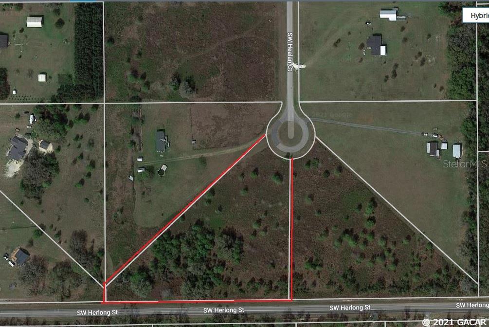4.9 acre acre parcel on the cul de sac in quiet subdivision with paved roads. Tract is comprised of mostly open meadow with a sprinkling of trees. Would make a great home site, set up a mobile home or small horse farm. Located in Southern Columbia County Florida, an area of homes, farms and recreational opportunities. A short drive from High Springs to the south, or Lake City to the north. Nearby is the Ichetucknee State Park and Three rivers recreational area with the confluence of the Suwannnee, Santa Fe and Ichetucknee Rivers, (swimming, tubing, kayaking, boating, fishing). Open Builder.