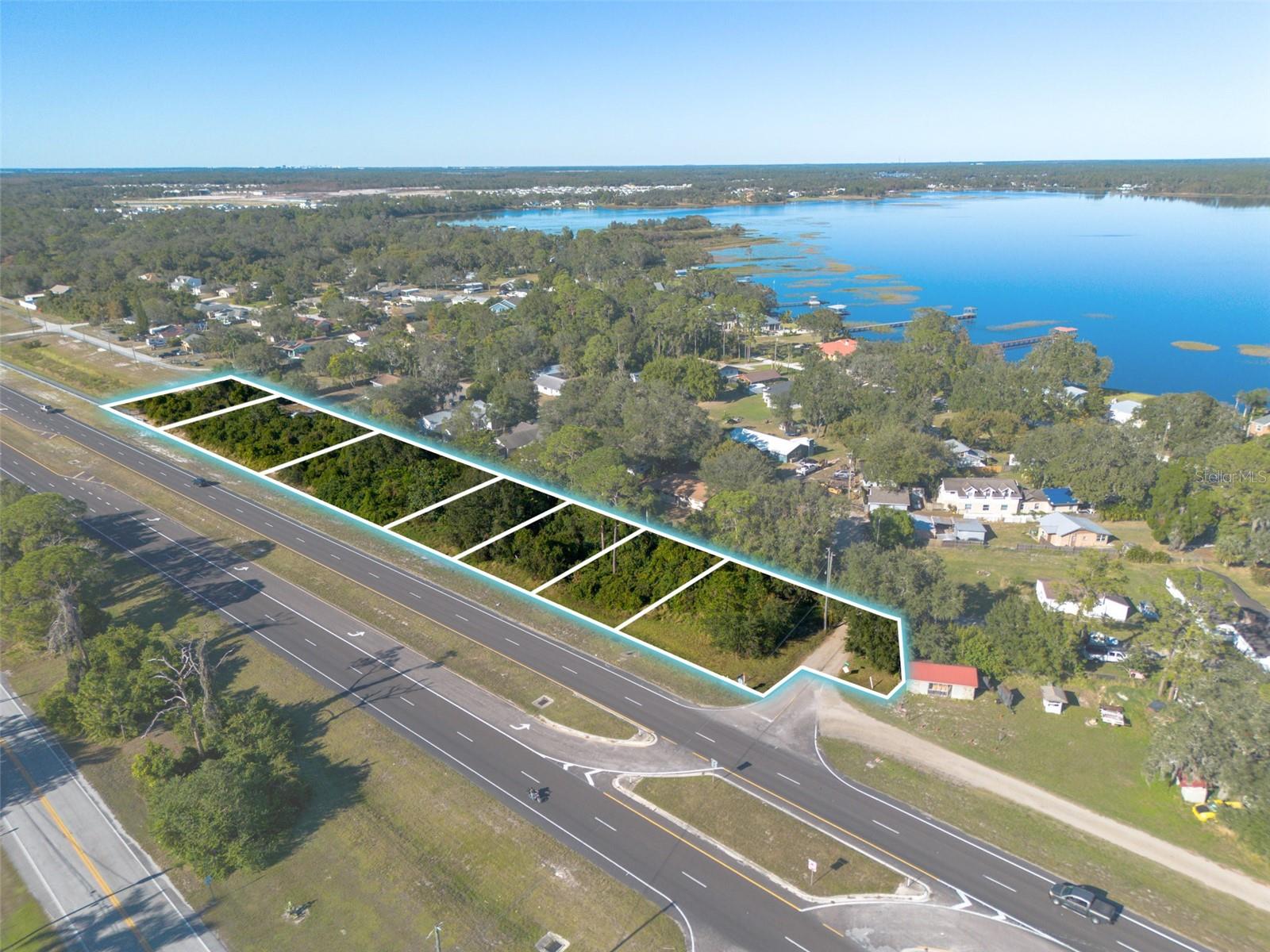 Location is key and this prime piece of commercial real estate is located just 1.5 miles from the NEW Amera Center Community Development. There are 7 lots to be sold together for a total of 1.33 acres. These lots are the perfect location for a small shopping plaza, medical or dental office building, or restaurant. Survey is being completed. All lots are zoned OCR (Osceola Commercial Restricted) which is an old and unused code. The lots need to be rezoned to the current commercial code and the Zoning dept. has stated that commercial is the future use code and will be granted without issue. It's a 3-4 month process and a $2,400 fee per form. Osceola Co. Development codes and permissible uses are located in the attachments. Setbacks for General Commercial are 25' from rear, and 10' from sides, with front/street side setback open(N/A). The options and possibilities are endless. A few of the options include a day care facility, gym, kennels or stables for boarding facilities, zoo, nursery, nursing home, convenience retail with gas pumps or residential over commercial businesses. This property is perfect for almost anything you can think of. What will you build? All information is deemed reliable but should be verified by Buyer.