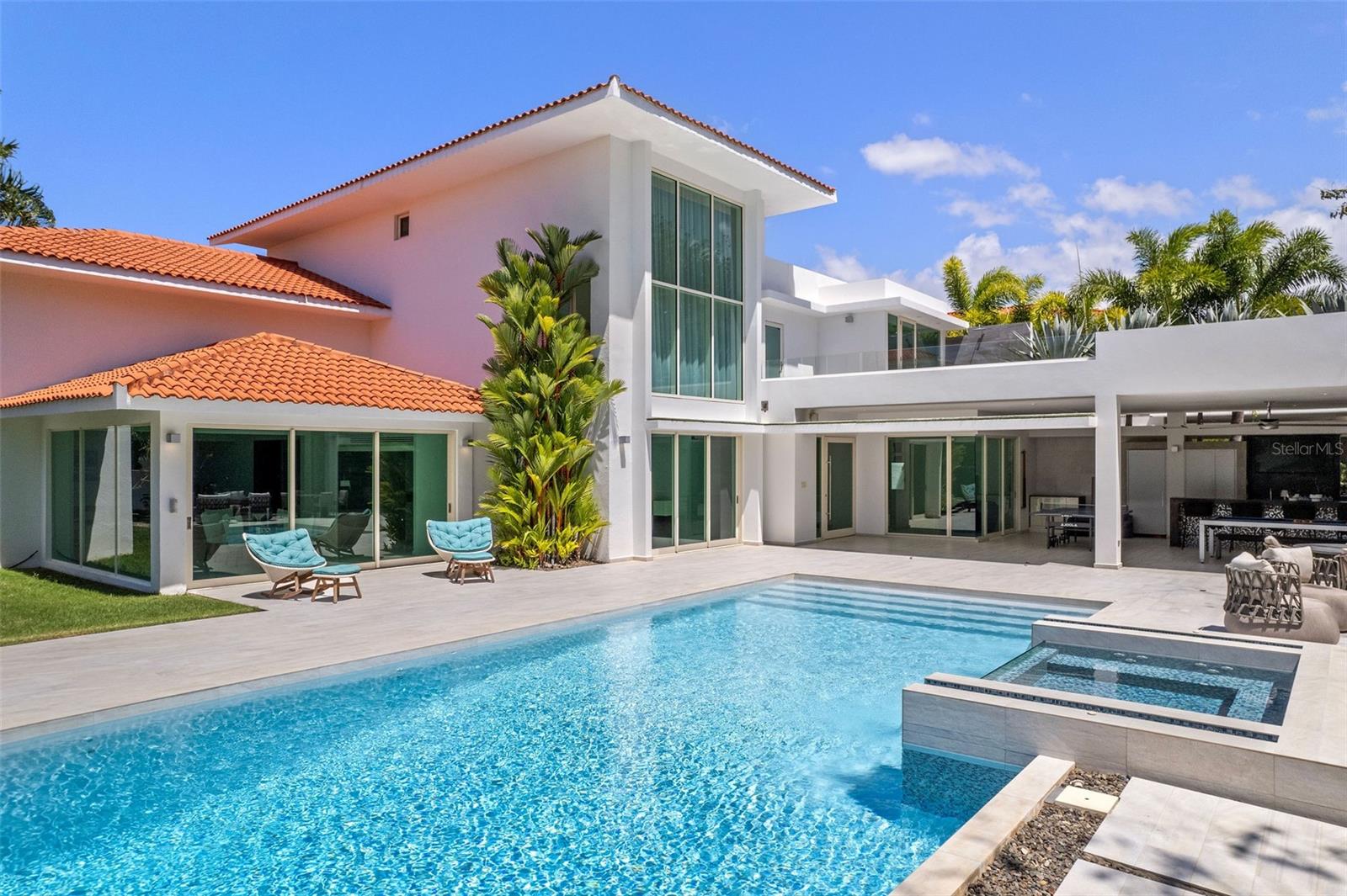 Stunning 6-bedrooms, 10-bathrooms home in Dorado Beach East. Located within the secure confines of Dorado Beach Resort, offering gated access and proximity to golf courses, beach and restaurants. This luxurious property boasts a pool and high-end amenities throughout.
The Dorado Beach East community is private, gated, family friendly and offers a wide range of facilities that you can enjoy. The facilities include scenic pools, clay tennis courts, basketball and beach volleyball courts, a basic gym, a game room, a 3-par golf course that winds through the neighborhood, and an aviation themed park which has a custom water park and sand park.
Located within the Dorado Beach Resort, since it is a 2,000-acre natural reserve most of the communities are 1-3 miles away from the beach and Hotel. This being said, the entire resort is interconnected via golf cart trails, meaning that you can have easy access (walking or in golf cart) to the different communities and amenities within this Resort.