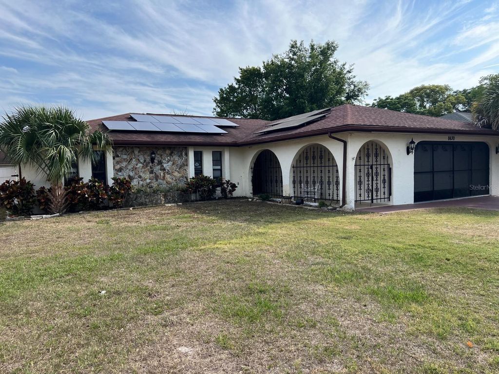 Photo of 8630 Winter Haven Drive, Hudson, FL 34667 (MLS # TB8351672)