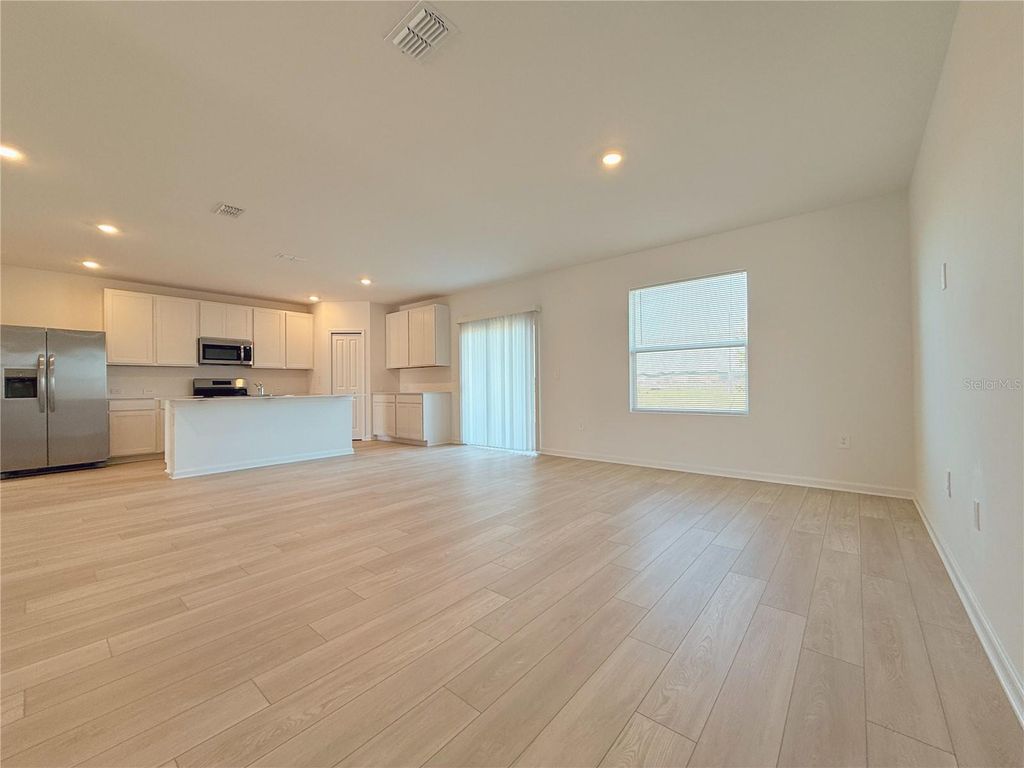 Photo of 6481 Domizio Drive, Winter Haven, FL 33884 (MLS # O6399616)