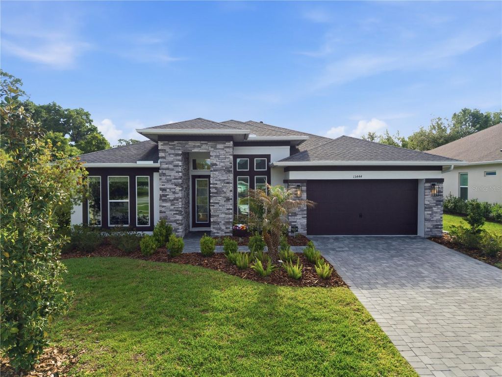 Photo of 13444 Trailing Moss Drive, Dade City, FL 33525 (MLS # TB8499043)