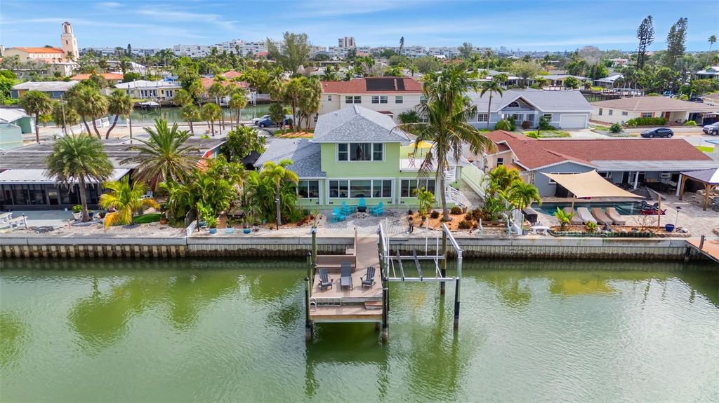 Photo of 8080 Coquina Way, St Pete Beach, FL 33706 (MLS # TB8428099)