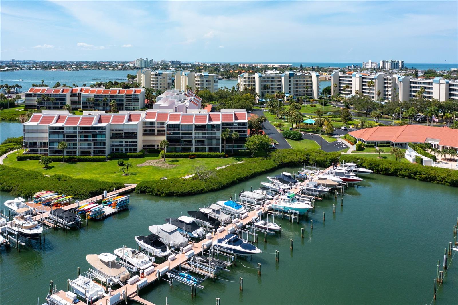 Welcome home to Harbourside Savannah, a highly desirable resort-style community in South Pasadena. This turnkey furnished 2-bedroom, 2-bathroom residence is situated on the coast of Boca Ciega Bay, offering picturesque water and marina views. At 1445 square feet, it is one of the largest floor plans on the island. The condo is a true oasis, featuring an enclosed lanai perfect for outdoor dining and entertaining. Overlooking the marina, this area is ideal for enjoying the Florida lifestyle year-round. Living in Harbourside means access to an array of exceptional amenities designed to enhance your quality of life. The community boasts 24-hour security for peace of mind, a clubhouse for social gatherings, and a well-equipped gym to help you stay active. Nature lovers will appreciate the walking paths, while sports enthusiasts can enjoy the tennis, shuffleboard, and pickleball courts. Additionally, the fitness center ensures that all your workout needs are met. For those who love the water, there are multiple pools and spas. St. Pete Beach, with its breathtaking sunsets and powder sand, is just a mile from your doorstep. Convenience is a hallmark of this location, with close proximity to entertainment options, dining establishments, and shopping venues, ensuring there's always something to do nearby. Property had no flooding from either 2024 storms. Schedule a private showing today and discover the lifestyle that awaits you in this remarkable South Pasadena community.