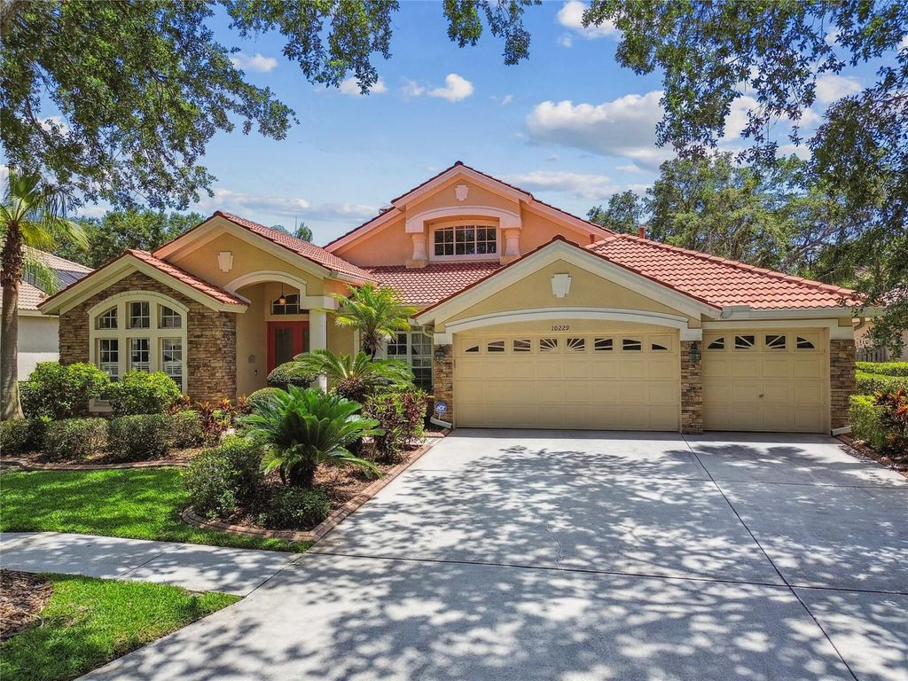 Photo of 10229 Waterside Oaks Drive, Tampa, FL 33647 (MLS # TB8383249)