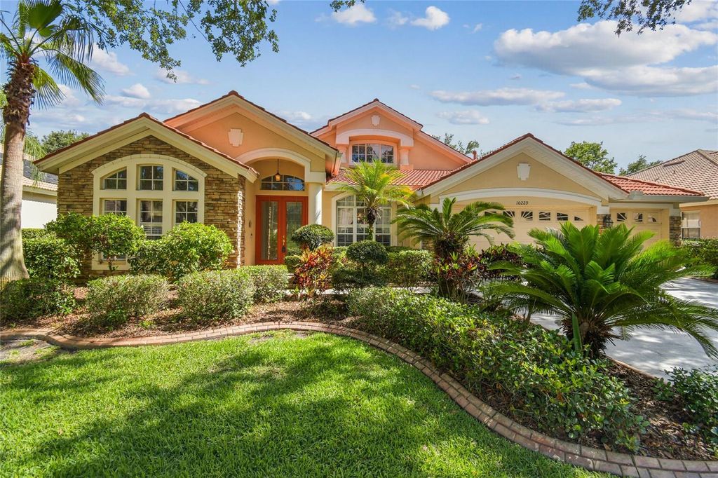 Photo of 10229 Waterside Oaks Drive, Tampa, FL 33647 (MLS # TB8383249)