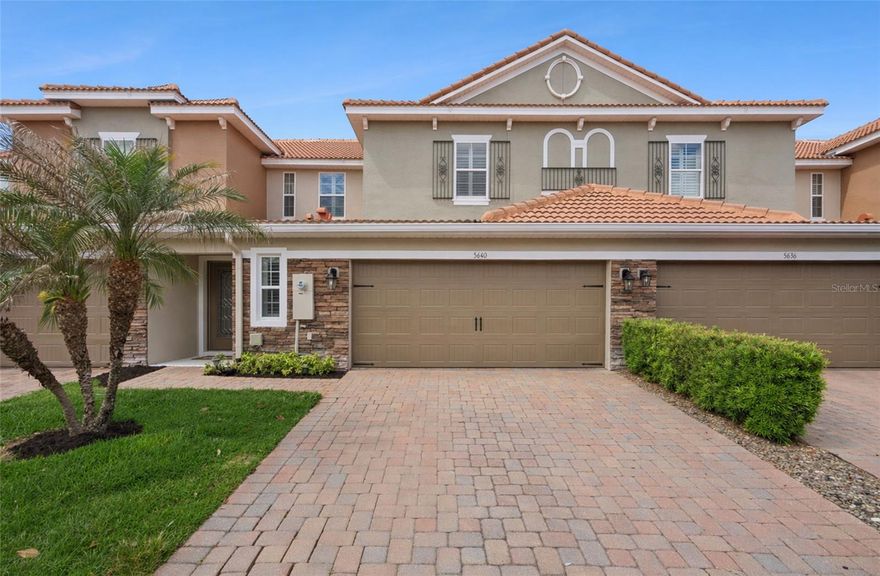 Experience waterfront living at its finest in this beautifully upgraded Terracina townhome. This popular Siena floor plan offers 4 bedrooms and 2.5 bathrooms, showcasing a primary bedroom on the main level, plantation shutters throughout, luxury vinyl plank flooring in all bedrooms and a newer HVAC system for added peace of mind. The open kitchen features a breakfast bar that seamlessly connects to the dining area, creating an inviting space for everyday meals or entertaining guests. The lower level is highlighted by ceramic tile flooring, crown molding, recessed lighting, ceiling fans, and a covered back patio that has been thoughtfully extended to maximize outdoor living. From here, enjoy serene water views making the space ideal for gatherings, morning coffee, or unwinding at sunset. The main-floor primary suite includes a spacious custom walk-in closet in addition to another clothes closet behind sliding mirrored doors. The bathroom includes dual sinks, a mirrored vanity, a garden tub and a separate shower. Upstairs, a light-filled loft overlooks the main living area and serves perfectly as a home office, second living area, or cozy reading nook. Three additional bedrooms provide generous space and share a full bathroom with granite countertops and a walk-in shower. Terracina is known for its Mediterranean-inspired architecture, charming barrel tile roofs, and brick paver driveways. Enjoy quiet moments on the front porch, friendly neighborhood conversations, and the lush landscaping throughout the community.