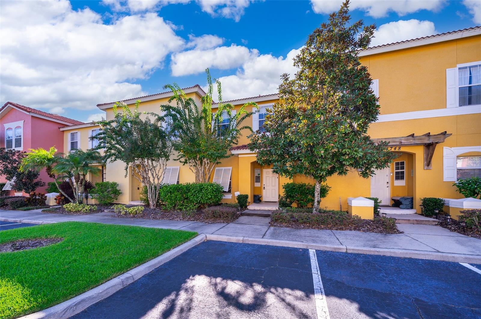 TURNKEY!!! Beautiful and Bright 3 Bedroom townhome with JACUZZI in Terra Verde Resort, only 7 miles from Disney. A Central HVAC system has been replaced in November 2022 (Condenser Nov 2024). New Water Heater Installed Sept. 2023. This home is sold Fully Furnished. On the main floor, you have a spacious Family Room, Dining Room, Kitchen, Guest Bathroom, and Laundry Room. Through a Large Sliding Door, you can enter a Courtyard where you can Soak up the sun, BBQ delicious lunch, or relax in your own private Jacuzzi. Use the back gate to take a trail leading to the Club House or the Lake. Going up the stairs, to the Right is a Large Master Bedroom (King Bed). The Master Bathroom has a Single Sink and a Walk-In Shower. Across the master are two more bedrooms (Twin and Queen), and a full bathroom (shower/tub). Resort Fees include Basic Cable, Internet, and Phone; as well as ALL the amazing amenities - Guard on duty 24/7, Clubhouse with a Large Pool (heated all year round), Jacuzzi, SaunaTiki Bar and Grill with a Lounge area, Hammocks, Ping Pong, Basketball, Tennis, Mini Golf, Games Room, Movie Theater, Gym, Fishing Lake (Catch/Release) and SO MUCH MORE!!! Terra Verde is One of the Best Resorts in Central Florida, only 7 miles from Disney