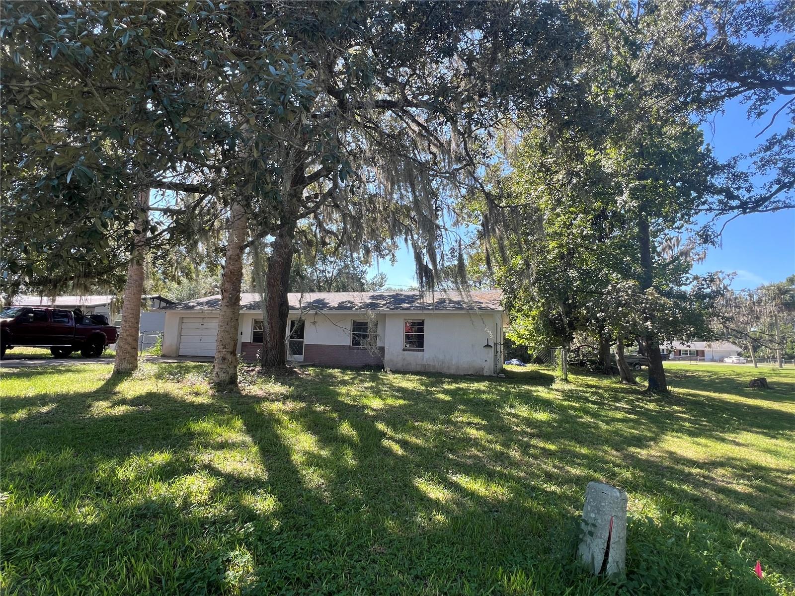 Charming Fixer-Upper Opportunity in the Heart of Crystal River – Big Potential, Amazing Location
Welcome to 738 NE 12th Terrace—a 3 bedroom, 2 bath home with loads of potential, ideally situated for anyone looking to make a smart investment, flip, or build a long-term rental. Priced to allow for upgrades, this home is ready for someone with vision to bring out what it truly can become.
Why This Location Delivers:
Only minutes to pristine springs, world-class boating, and peaceful kayaking spots. Crystal River is famous for manatee encounters, scalloping, and glorious waterfront adventures—and many are only short drives away.
Easy access to Gulf Coast beaches. For a day at the shore, you won’t have to travel far—coastal escapes are within reach.
Quick drives to shopping, dining, and everyday amenities. Local shops, grocery stores, and restaurants are nearby so errands don’t feel like a chore.
Neighbors include natural springs, state parks, and scenic drives—if you love the outdoors, this region delivers.
What This Home Offers:
A solid, affordable structure with 3 bedrooms, 2 baths, 1,206 sqft on a large lot over 9,300 sqft.
Screened back porch, fenced yard: perfect for pets, outdoor entertaining, relaxing afternoons.
Never flooded—a huge plus in Florida!
As-is condition, giving you the freedom to choose finishes, modernize where needed, and increase value. Ideal for DIYs, flippers, or investors.
Run the Numbers / Imagine the Upside:
Start with a lower entry cost. Invest some sweat equity, do updates, and watch the home’s value climb in one of the more desirable small-town Florida areas.
Use as a long-term rental or AirBnB — location appeals: nature lovers, retirees, fishing & boating enthusiasts, vacationers.
The kind of project where thoughtful upgrades (kitchen, bathrooms, flooring) will likely give strong returns, especially with the location perks.
This home is for someone who sees more than four walls—someone who’s ready to roll up their sleeves, add character, and make something special. If you’re looking for value in an unbeatable Florida setting, this one’s for you. BRING YOUR CASH OFFERS NOW !!